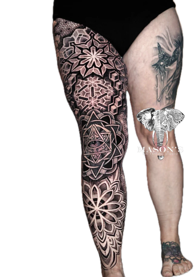 Mandala Tattoo Design: Intricate mandala and elephant leg tattoo with geometric patterns