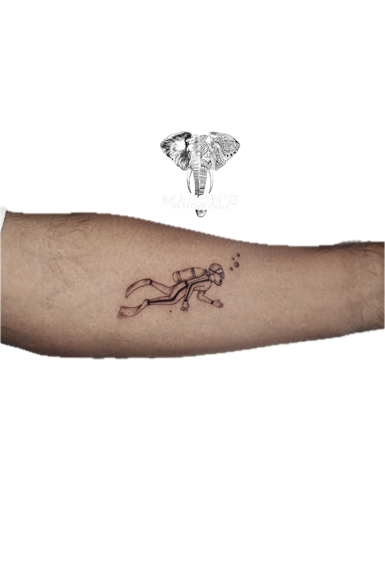 Black and Grey Diver Tattoo Design: a small minimalist tattoo of a monkey climbing a tree