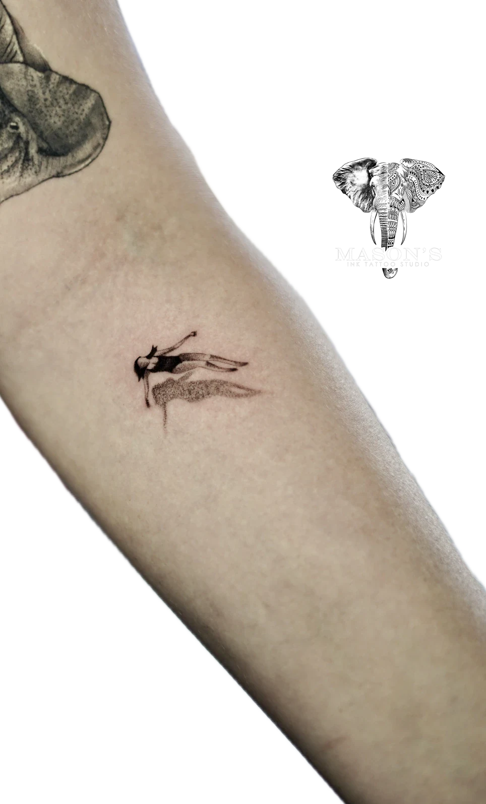Black and Grey Woman Swim & Floating on the Sea Tattoo by Mason's Ink Tattoo Studio, Bali