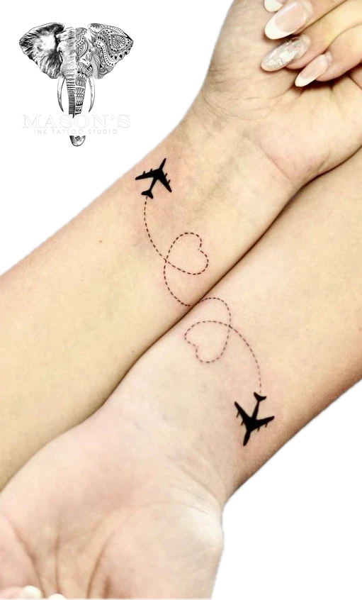 Fine Line Couple hand Plane tattoo by Mason's Ink Tattoo Studio, Bali
