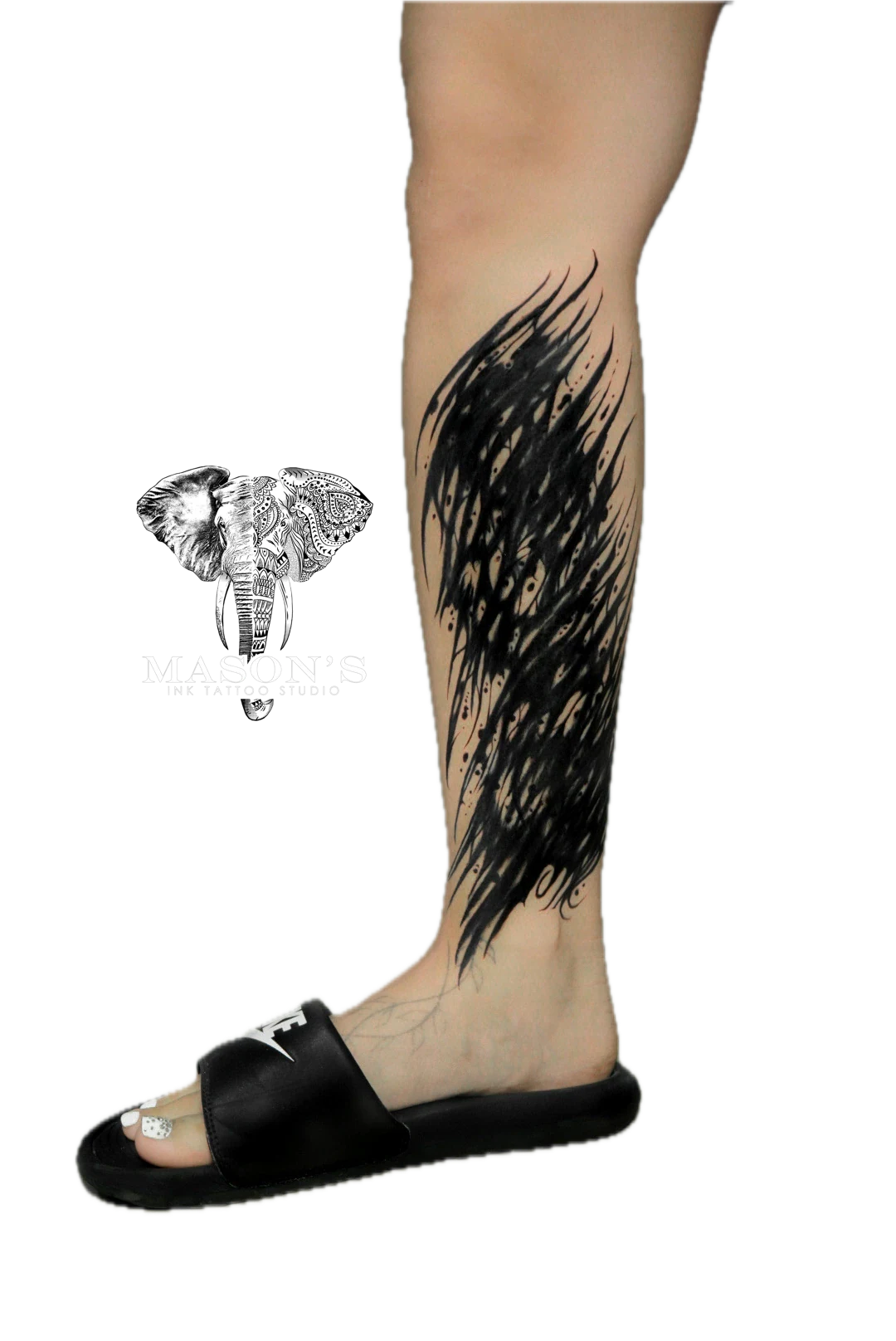 Black Work Abstract Tattoo Design: Large black and grey feather design with lettering on calf