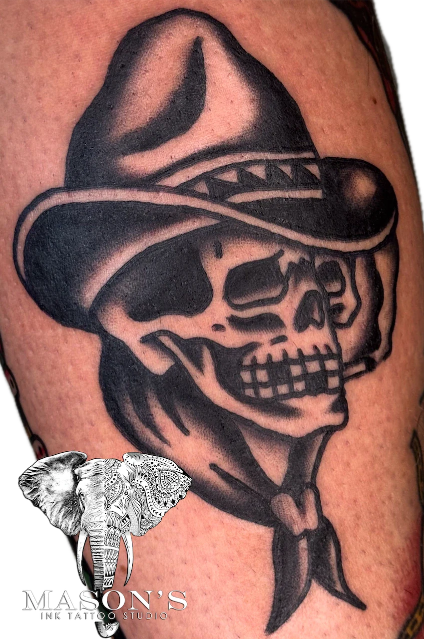 Classic Black and Grey Skull in Hat Tattoo Design - American Traditional tattoo by Mason's Ink Tattoo Studio, Bali