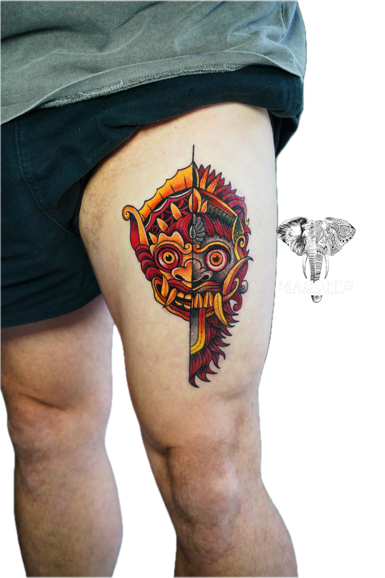Colored Barong Tattoo Design: a colorful mythological mask with flames and a snake