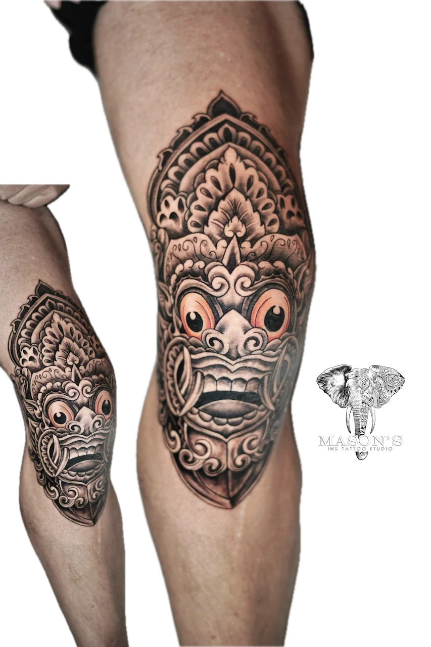 Traditional Barong Tattoo Design: Detailed ornamental mask tattoo on the calf
