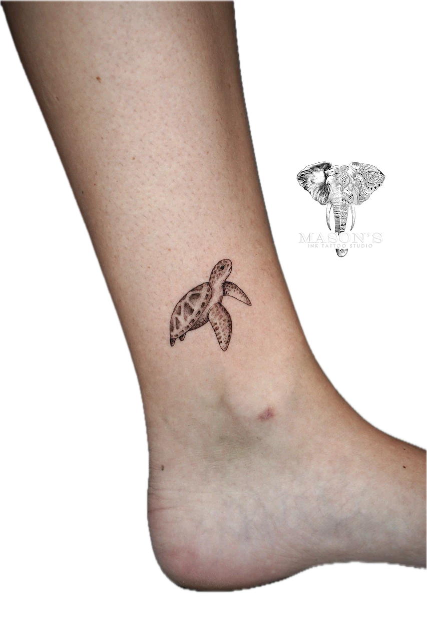 Black and Grey Turtle Tattoo Design: a small black and grey turtle on the ankle