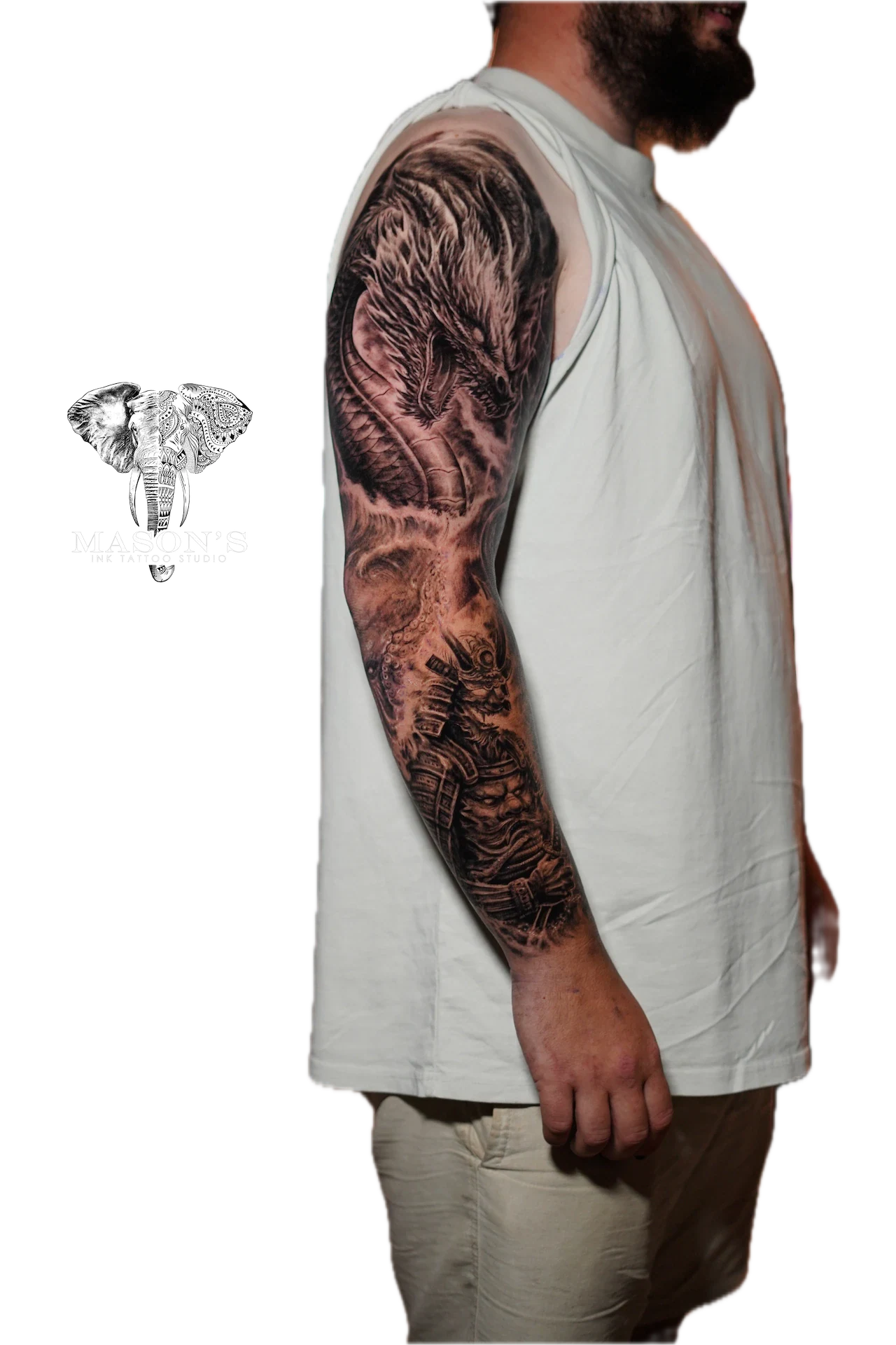 Black and Grey Japenese Tattoo Style: a large black and grey tree sleeve with a face and roots