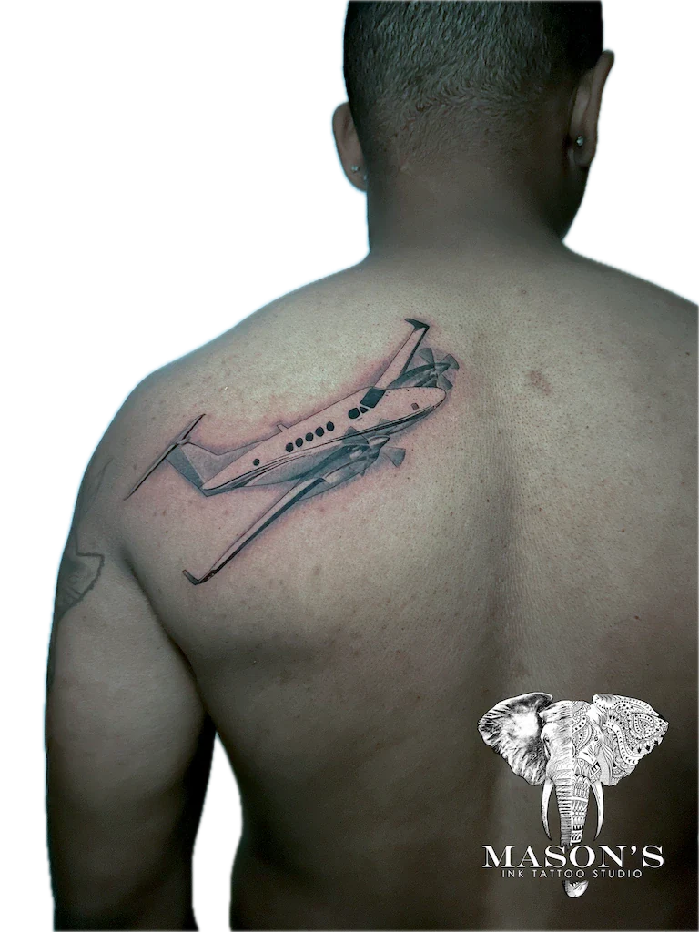 Black and Grey Airplane Tattoo Design - Black & Grey tattoo by Mason's Ink Tattoo Studio, Bali