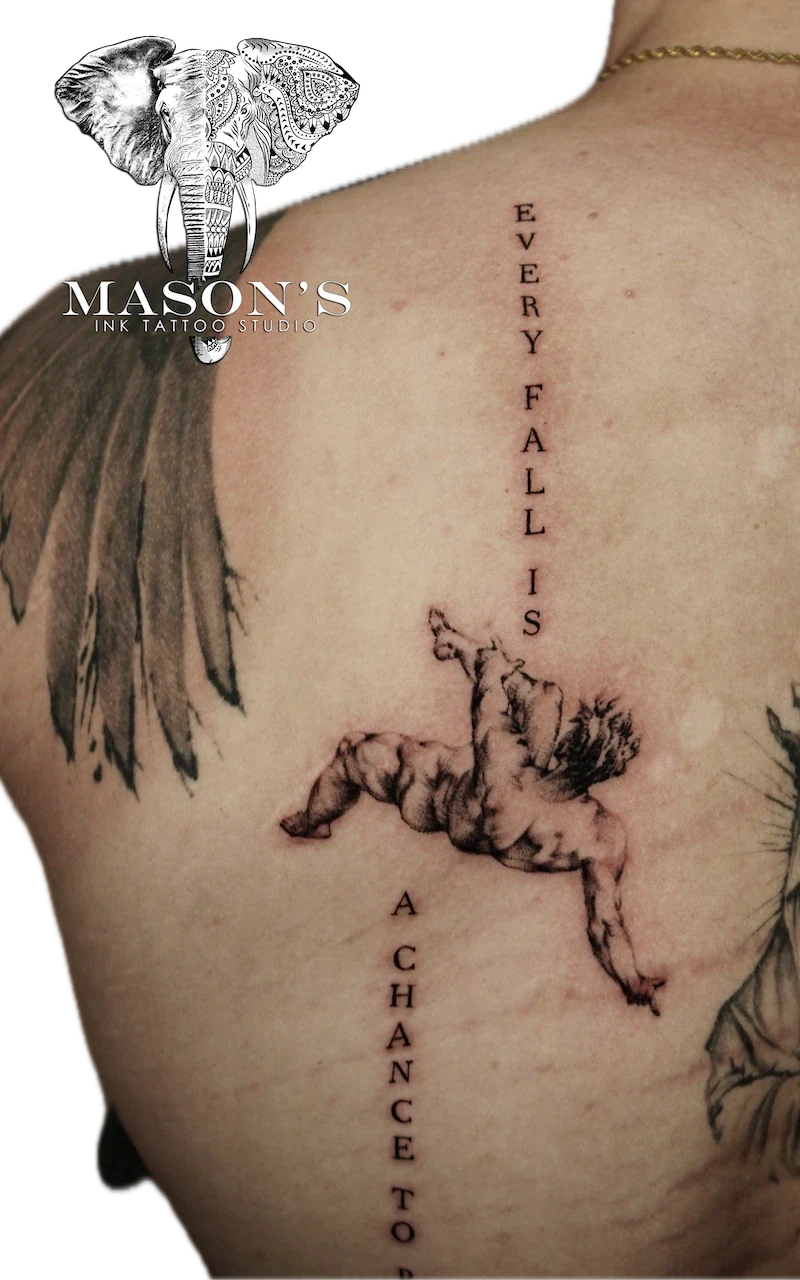 Black and Grey Angel with Script Tattoo Design - Black & Grey tattoo by Mason's Ink Tattoo Studio, Bali