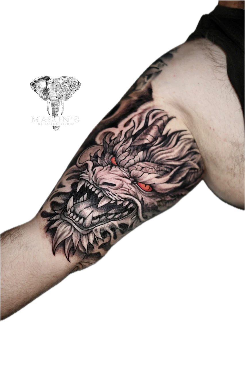 Black and Grey Dragon Tattoo with Colored Eye - Black & Grey tattoo by Mason's Ink Tattoo Studio, Bali