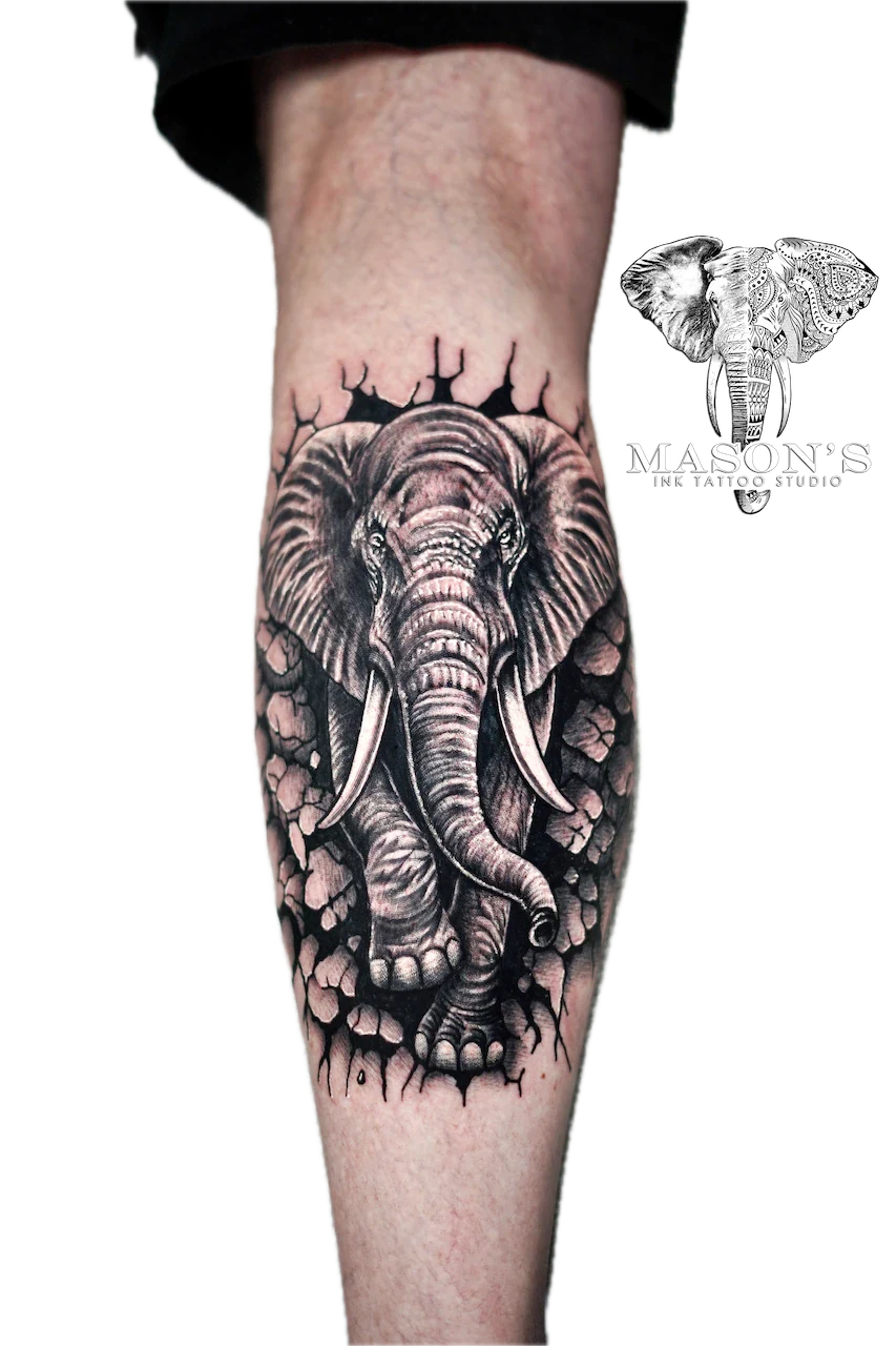 Black and Grey Elephant Tattoo Design: a detailed elephant emerging from a tree on a forearm