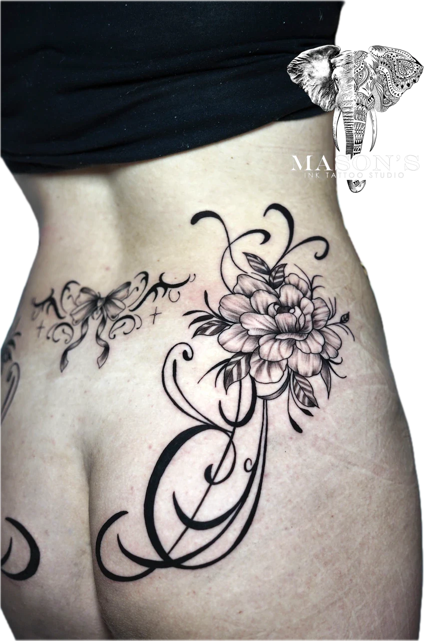 Black and Grey Fineline Floral Tattoo Design: a detailed flower and butterfly tattoo with swirling vines