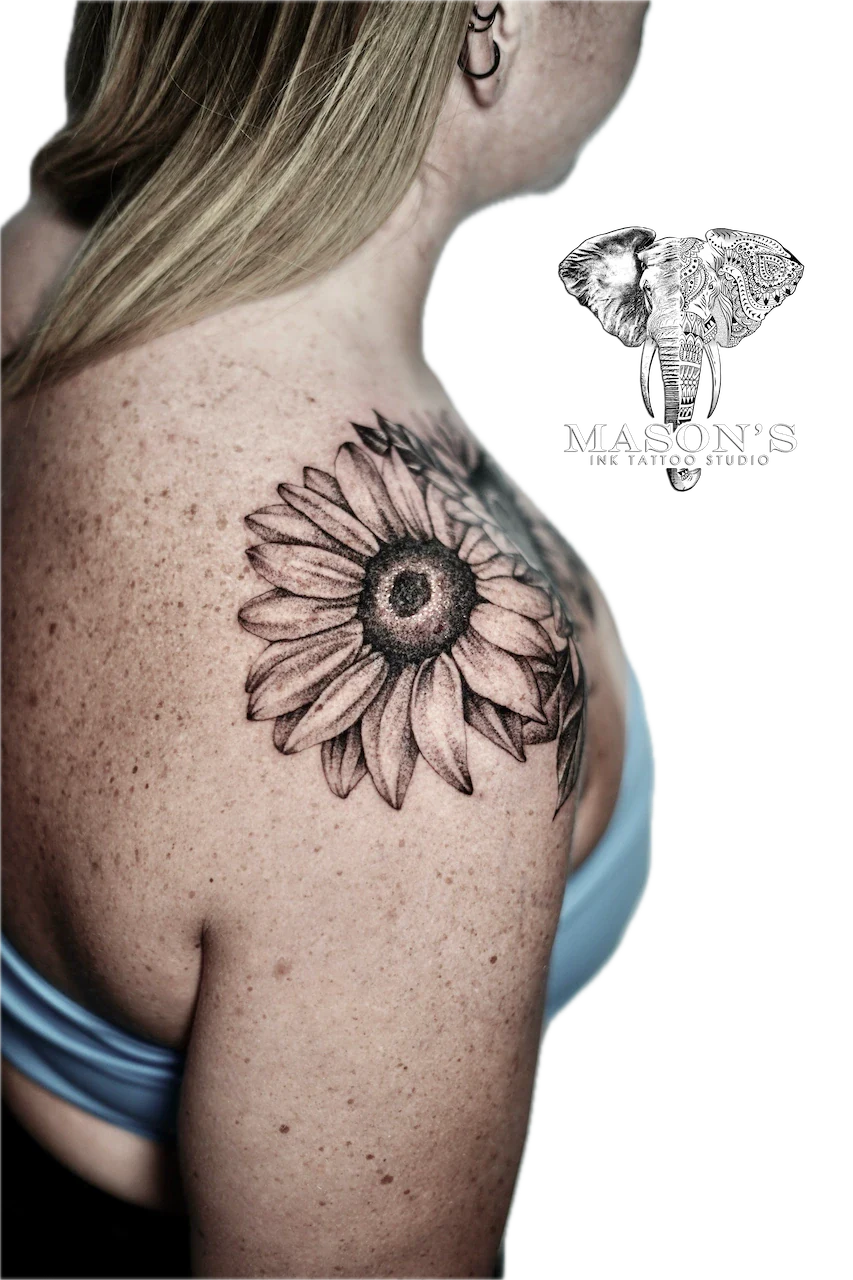 Black and Grey Floral Flower Tattoo Design: a detailed black and grey sunflower on the shoulder