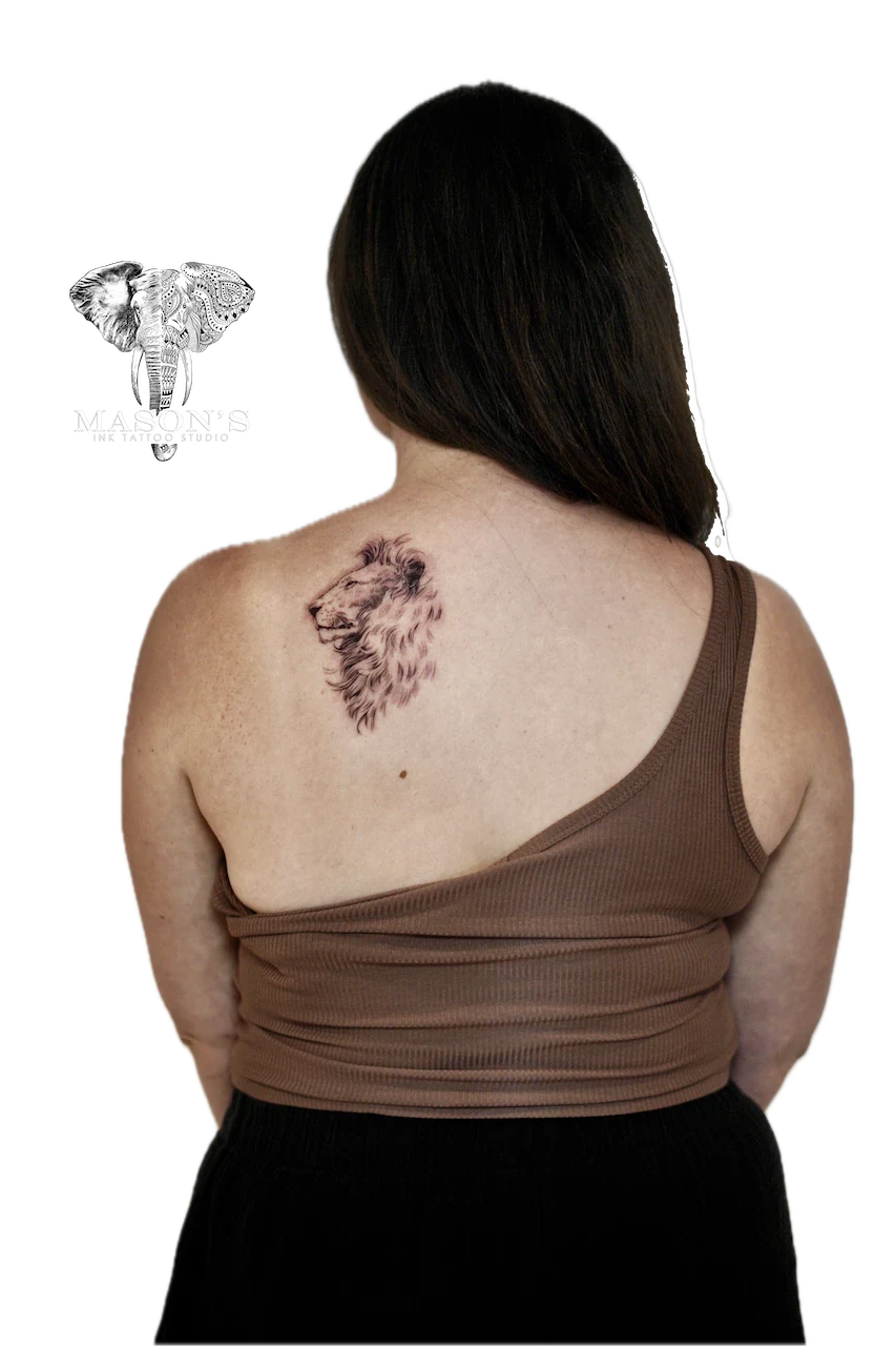 Black and Grey Lion Back Tattoo Design by Mason's Ink Tattoo Studio, Bali