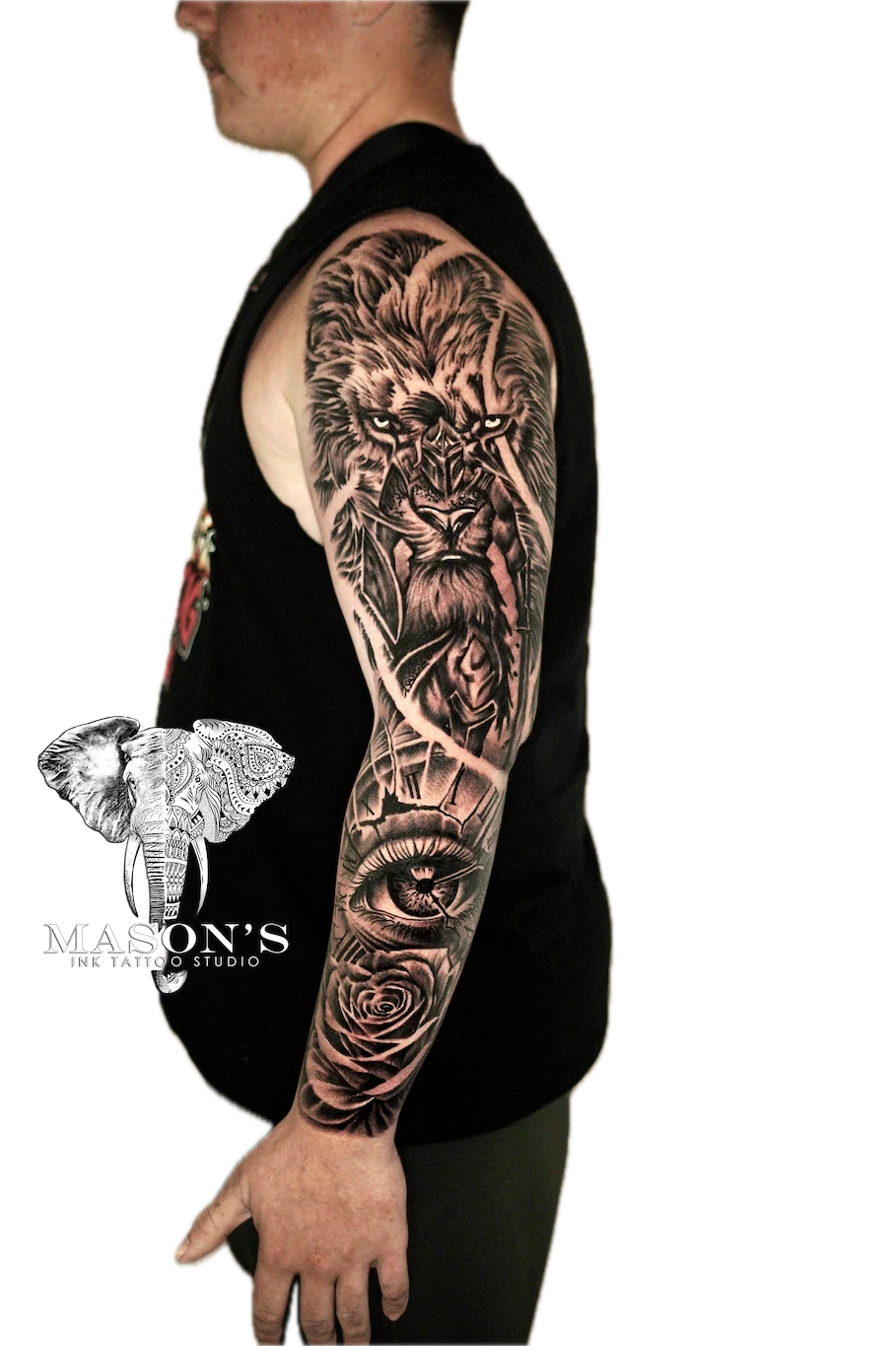 Black and Grey Lion and Eye Tattoo Design - Black & Grey tattoo by Mason's Ink Tattoo Studio, Bali