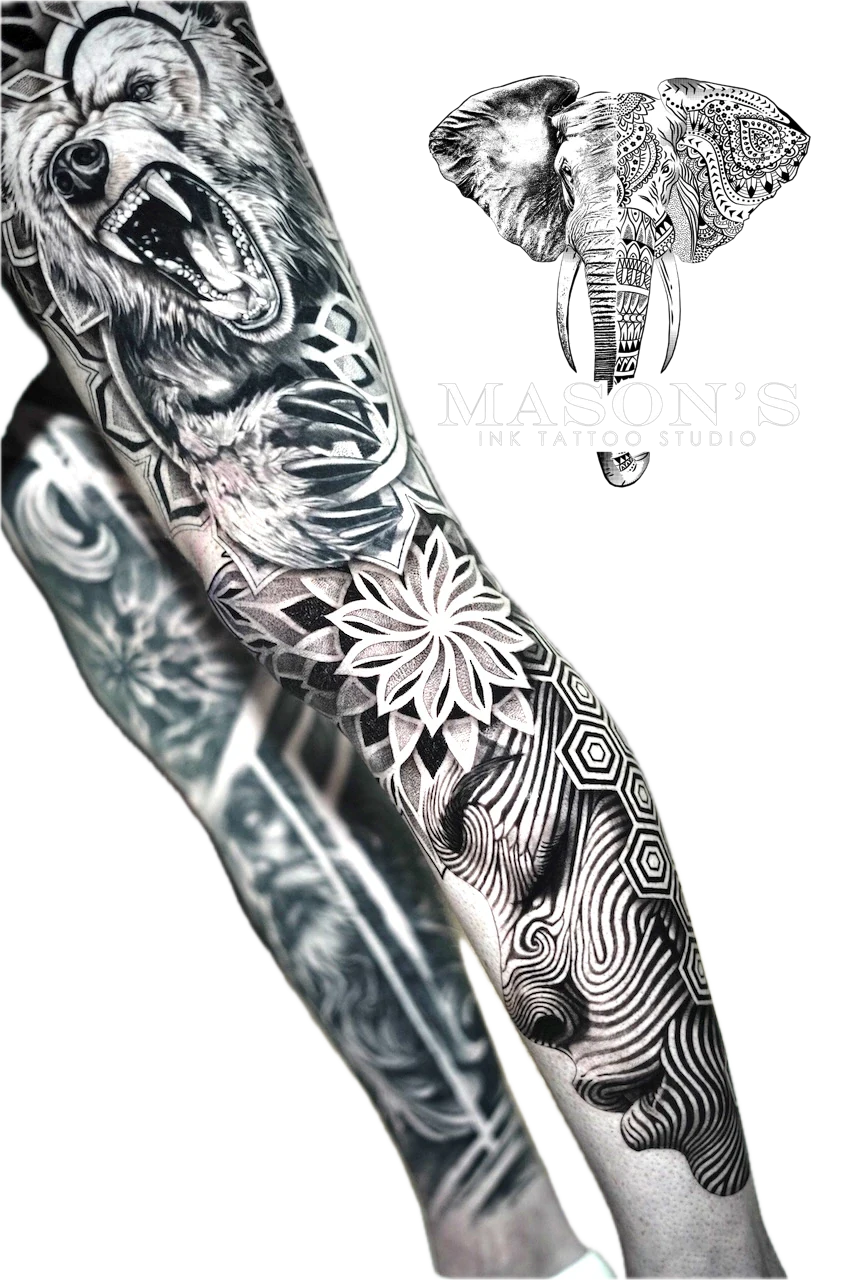 Black and Grey Mandala Bear Face Realism Tattoo Design: a full sleeve tattoo featuring a wolf, elephant, flowers, and geometric patterns