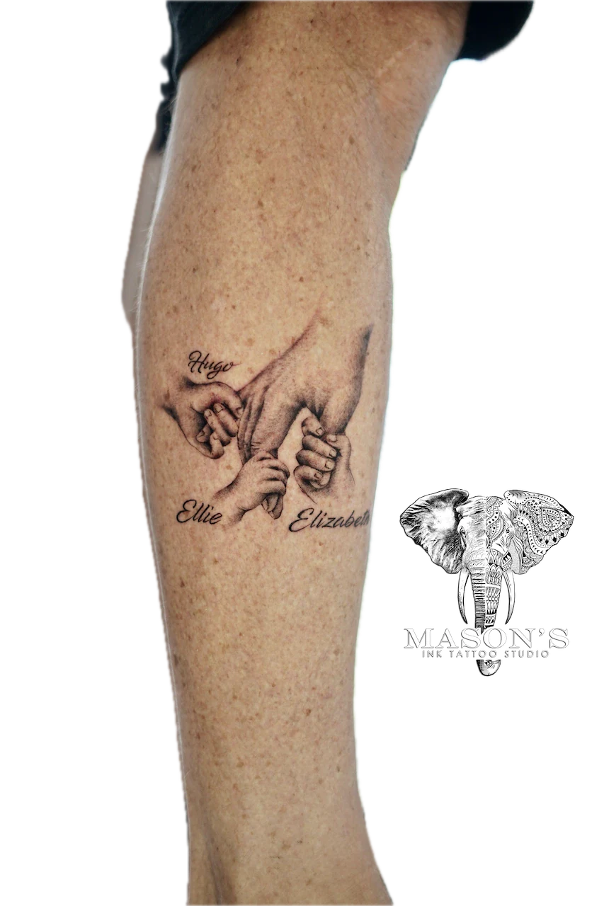 Black and Grey Mom Hand and Child Tattoo Design - Black & Grey tattoo by Mason's Ink Tattoo Studio, Bali