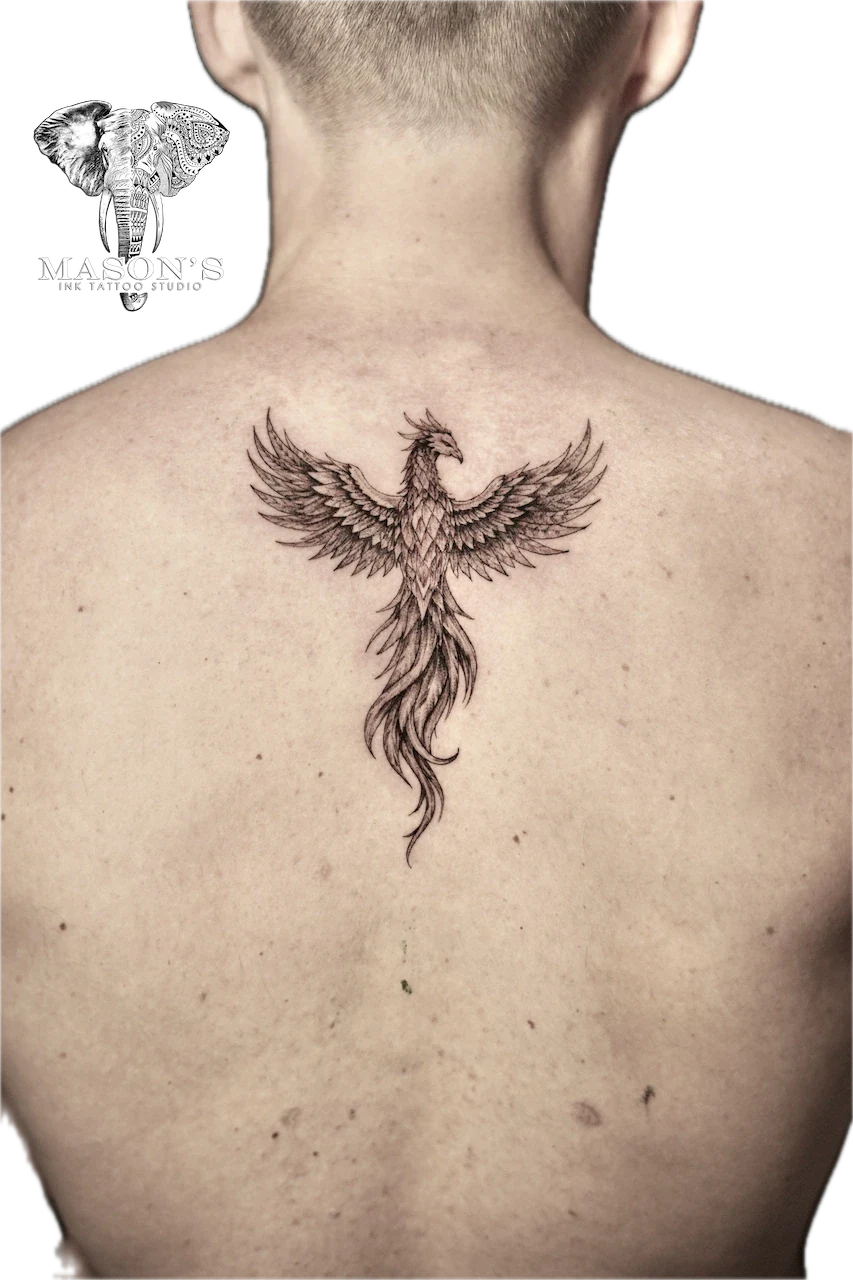 Black and Grey Phoenix Tattoo Design: a detailed phoenix tattoo on the upper back