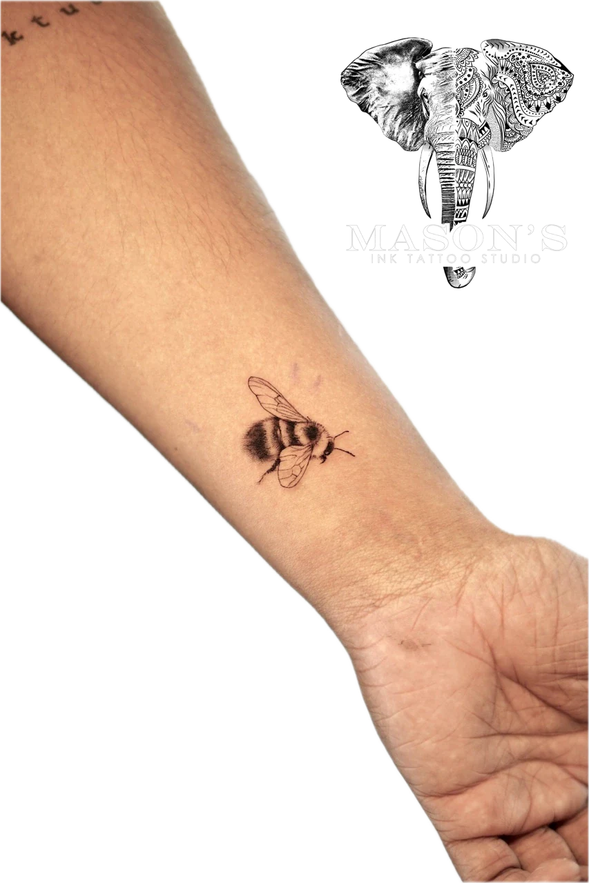 Black and Grey Realism Bee Tattoo Design by Mason's Ink Tattoo Studio, Bali