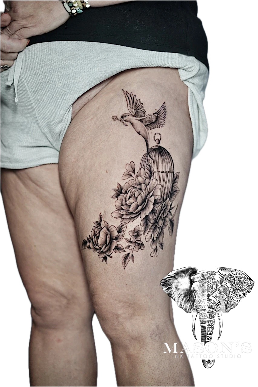 Black and Grey Realism Bird and Floral Tattoo Design by Mason's Ink Tattoo Studio, Bali