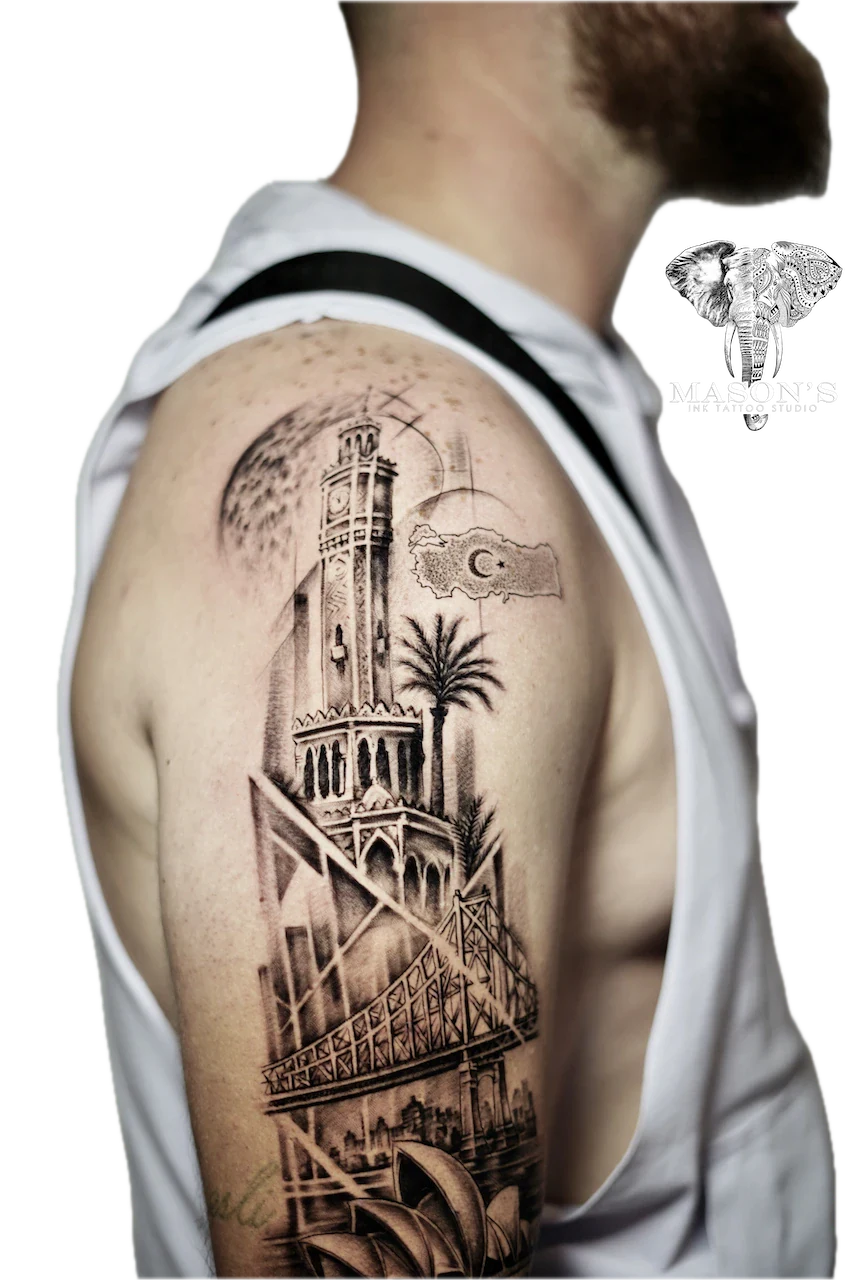 Black and Grey Realism City Tattoo Design: Detailed black and grey clock tower and bridge tattoo on upper arm