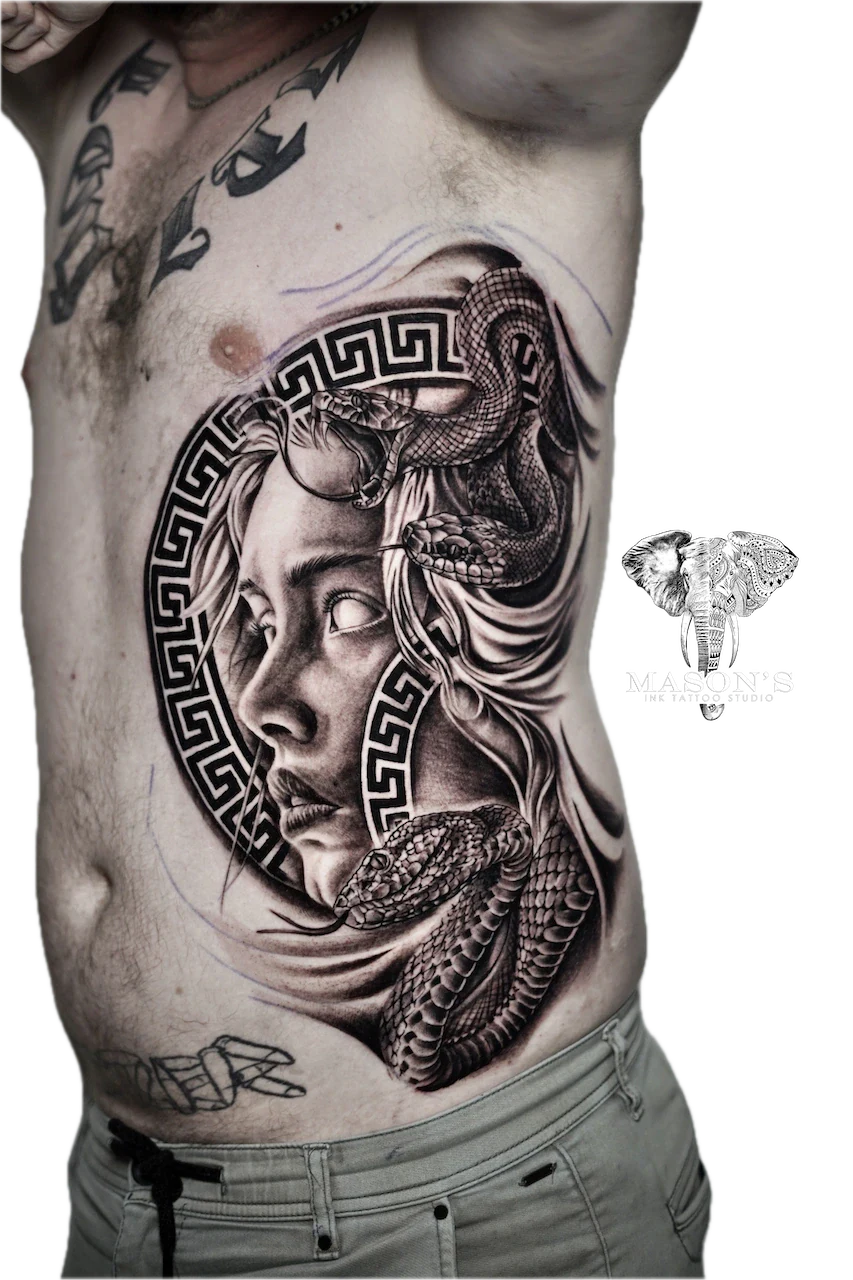 Black and Grey Realism Face and Snake Tattoo Design by Mason's Ink Tattoo Studio, Bali