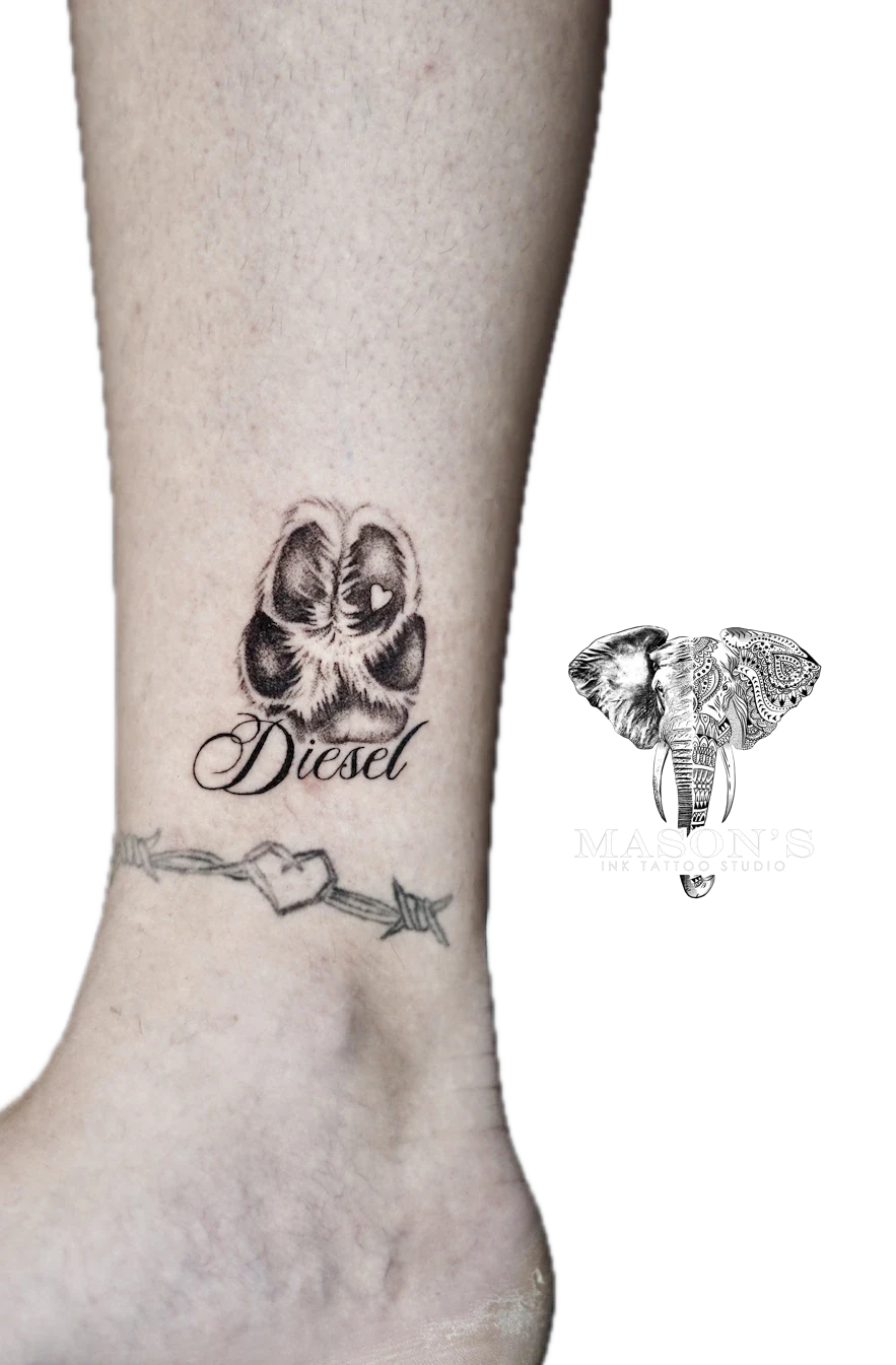 Black and Grey Realism Script Dog Paw with Script Diesel tattoo by Mason's Ink Tattoo Studio, Bali