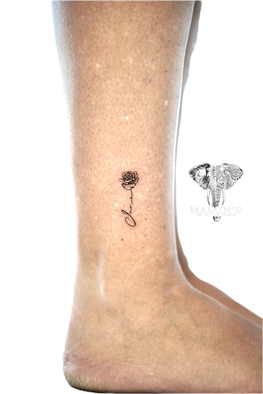 Black and Grey Rose Script Floral Tattoo Design by Mason's Ink Tattoo Studio, Bali