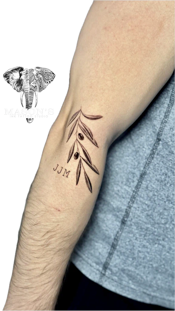 Black and Grey Script Leaf Tattoo by Mason's Ink Tattoo Studio, Bali