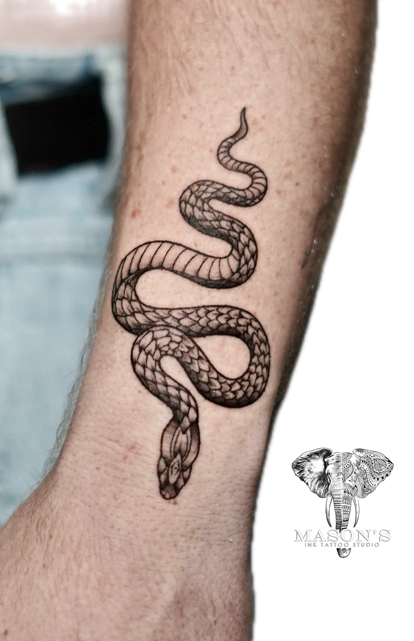 Black and Grey Snake Tattoo Design: a detailed snake tattoo coiled on the forearm