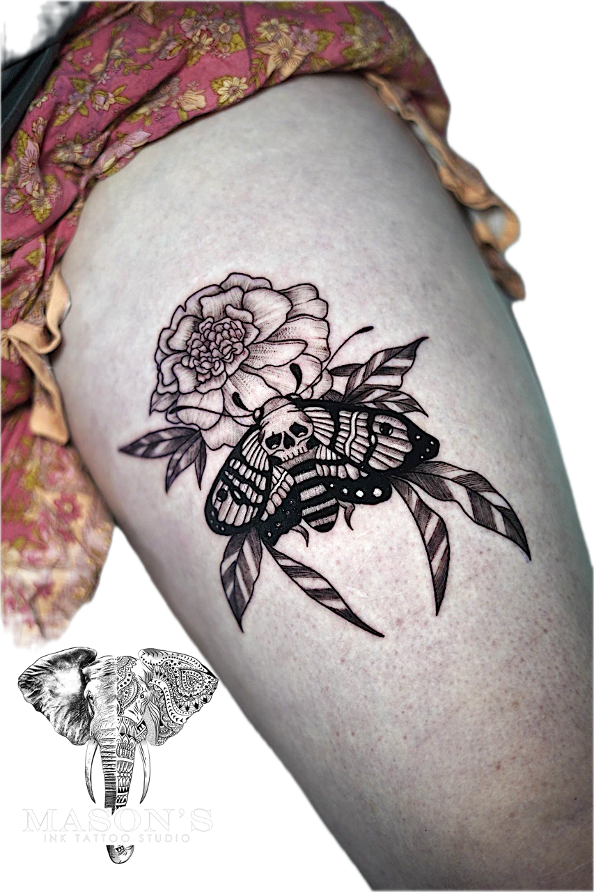 Black and Grey Tattoo Style Flower with Butterfly by Mason's Ink Tattoo Studio, Bali