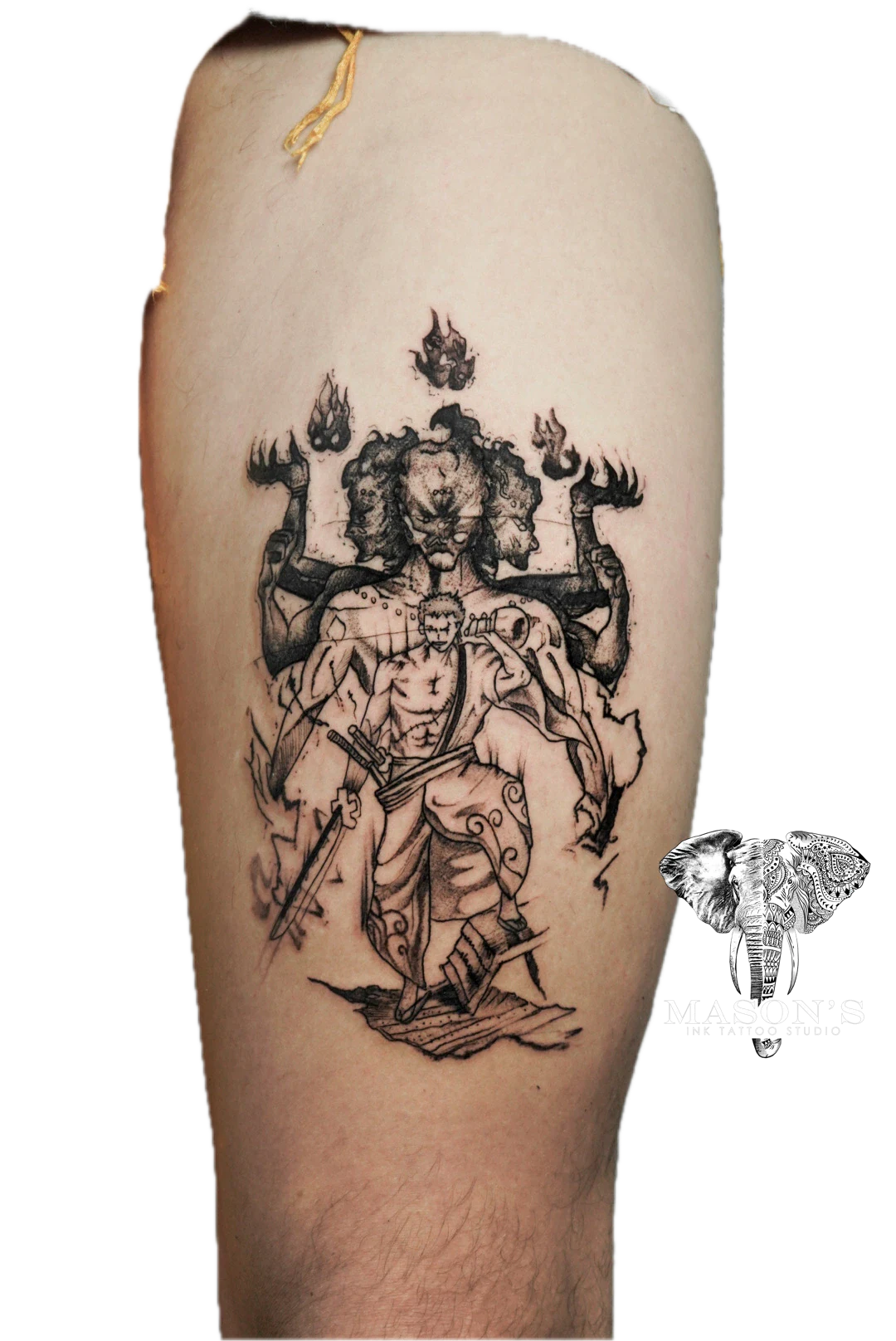 Black and Grey Tattoo Design: a large black and grey mythological portrait on a calf