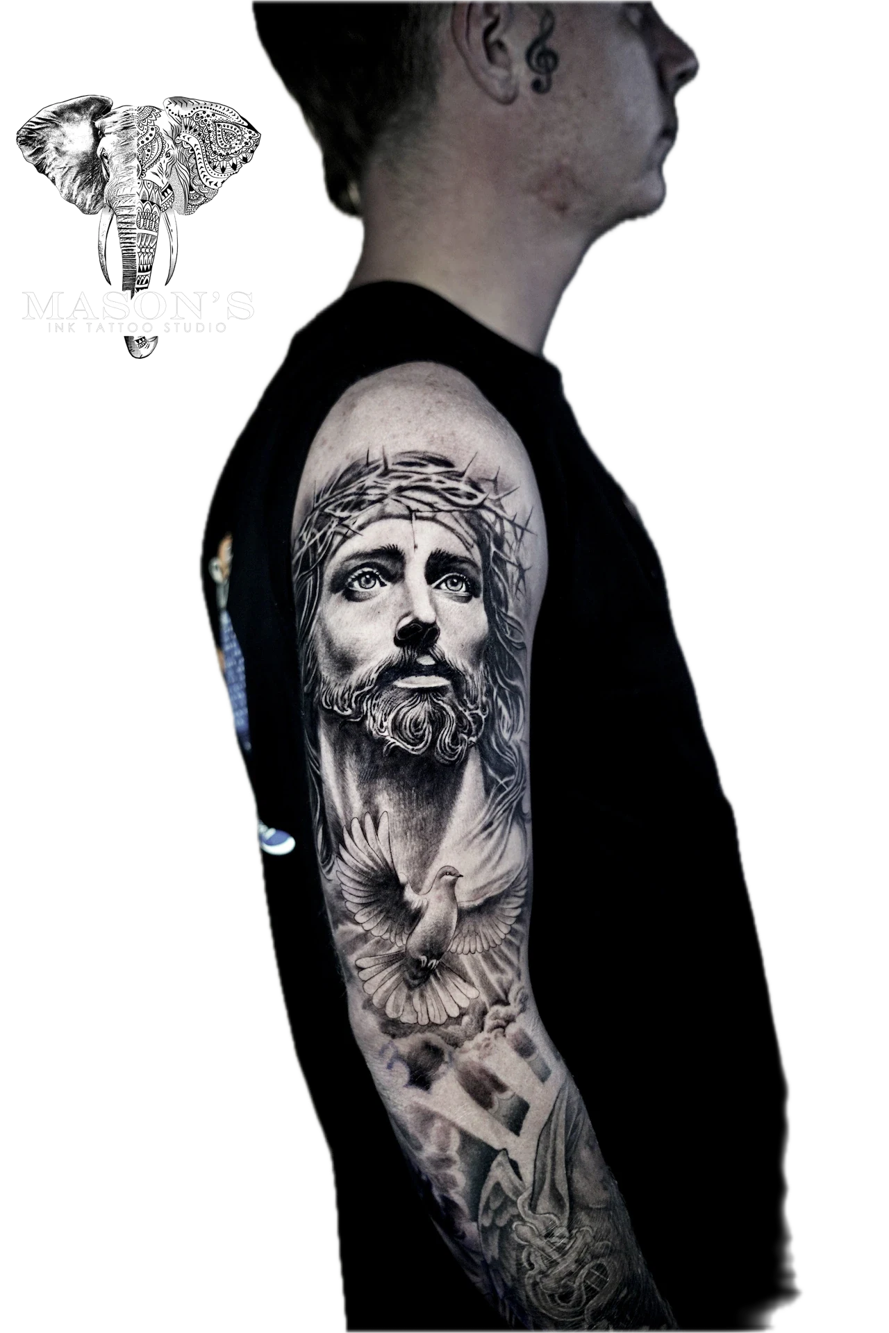Realism Black and Grey Jesus Tattoo with Bird Cloud by Mason's Ink Tattoo Studio, Bali