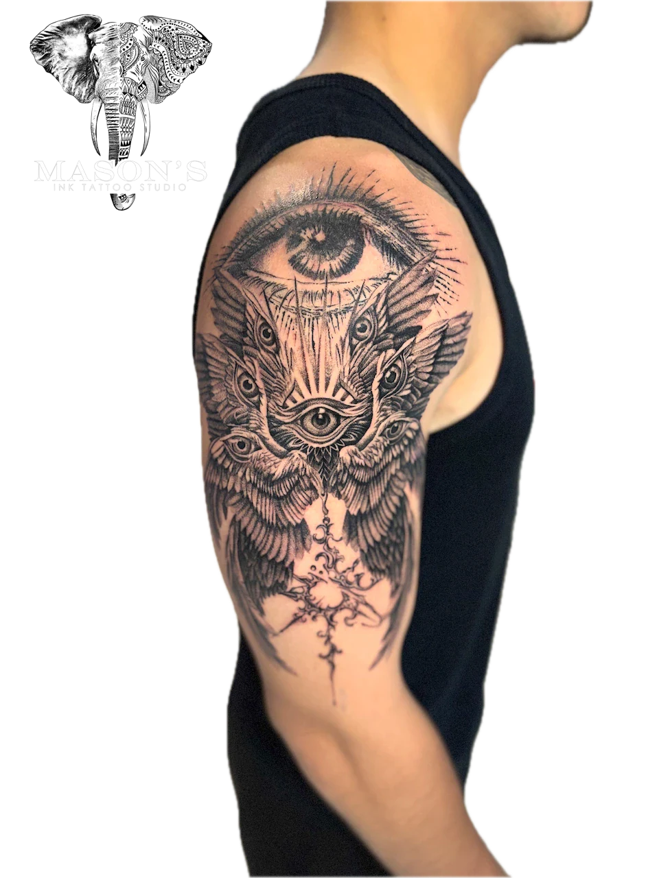 Realism Black and Grey Tattoo Style Wings and Eye by Mason's Ink Tattoo Studio, Bali