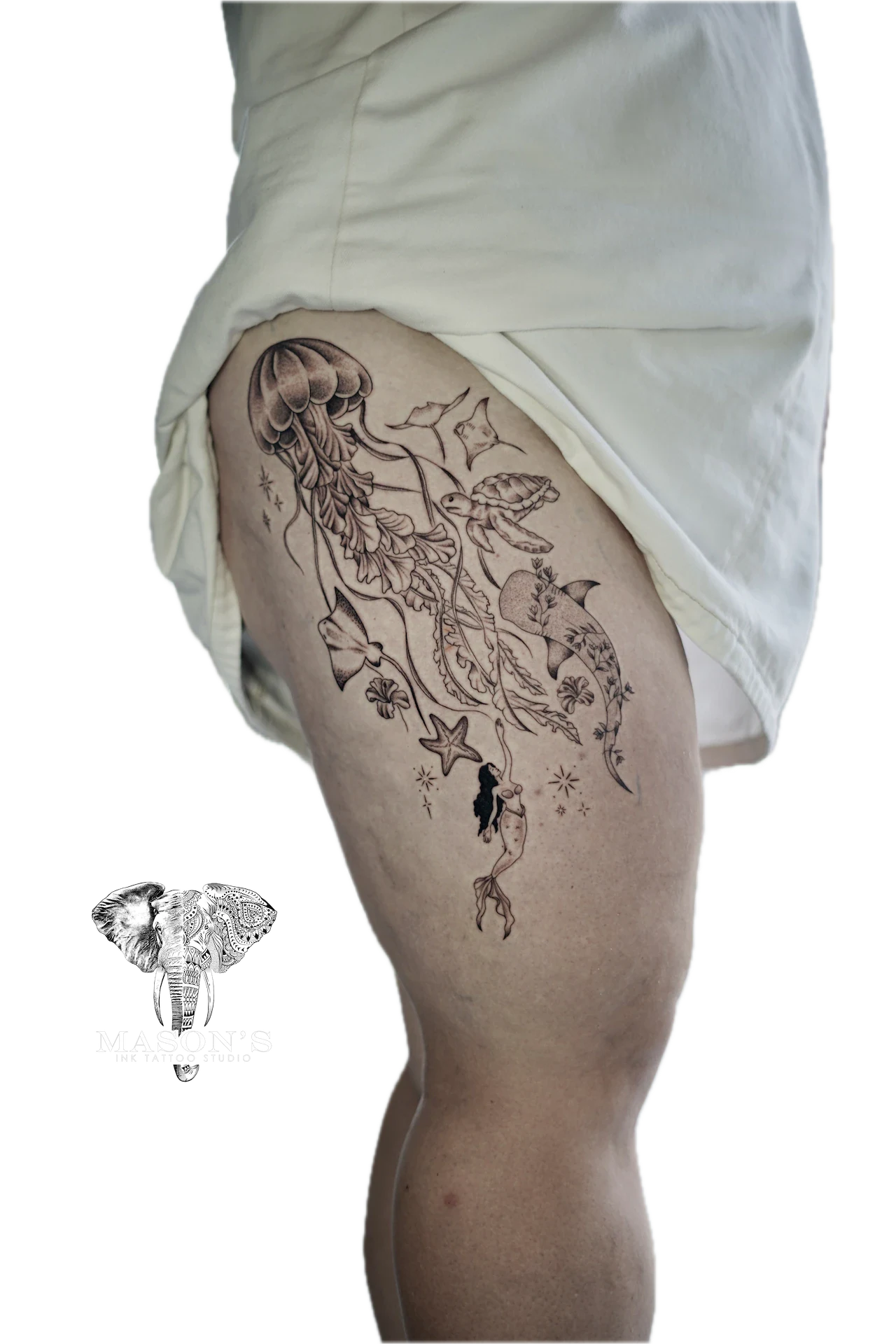 Black and grey sea creatures tattoo with jellyfish, manta, turtle, whale and mermaid by Mason's Ink Tattoo Studio, Bali