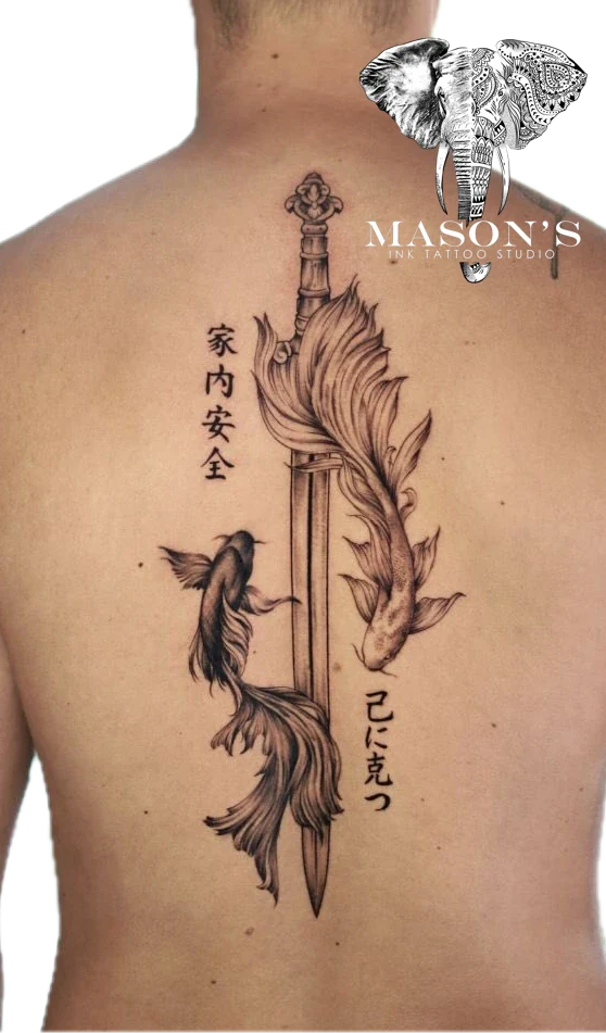 Black and grey japanaese Koi tattoo by Mason's Ink Tattoo Studio, Bali