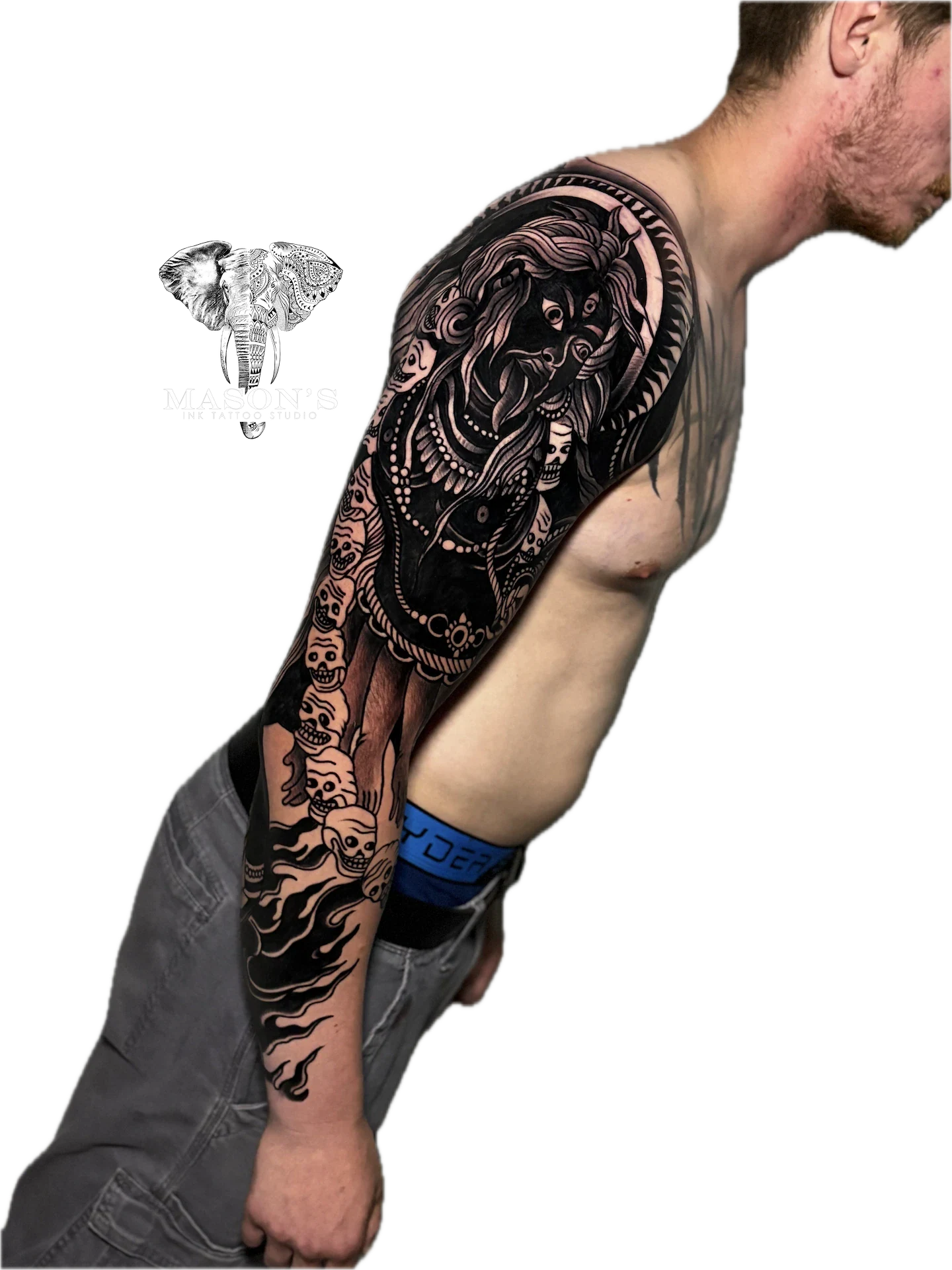 Blackwork Realism Mythology Tattoo Design: a full sleeve tattoo featuring skulls, snakes, and intricate patterns
