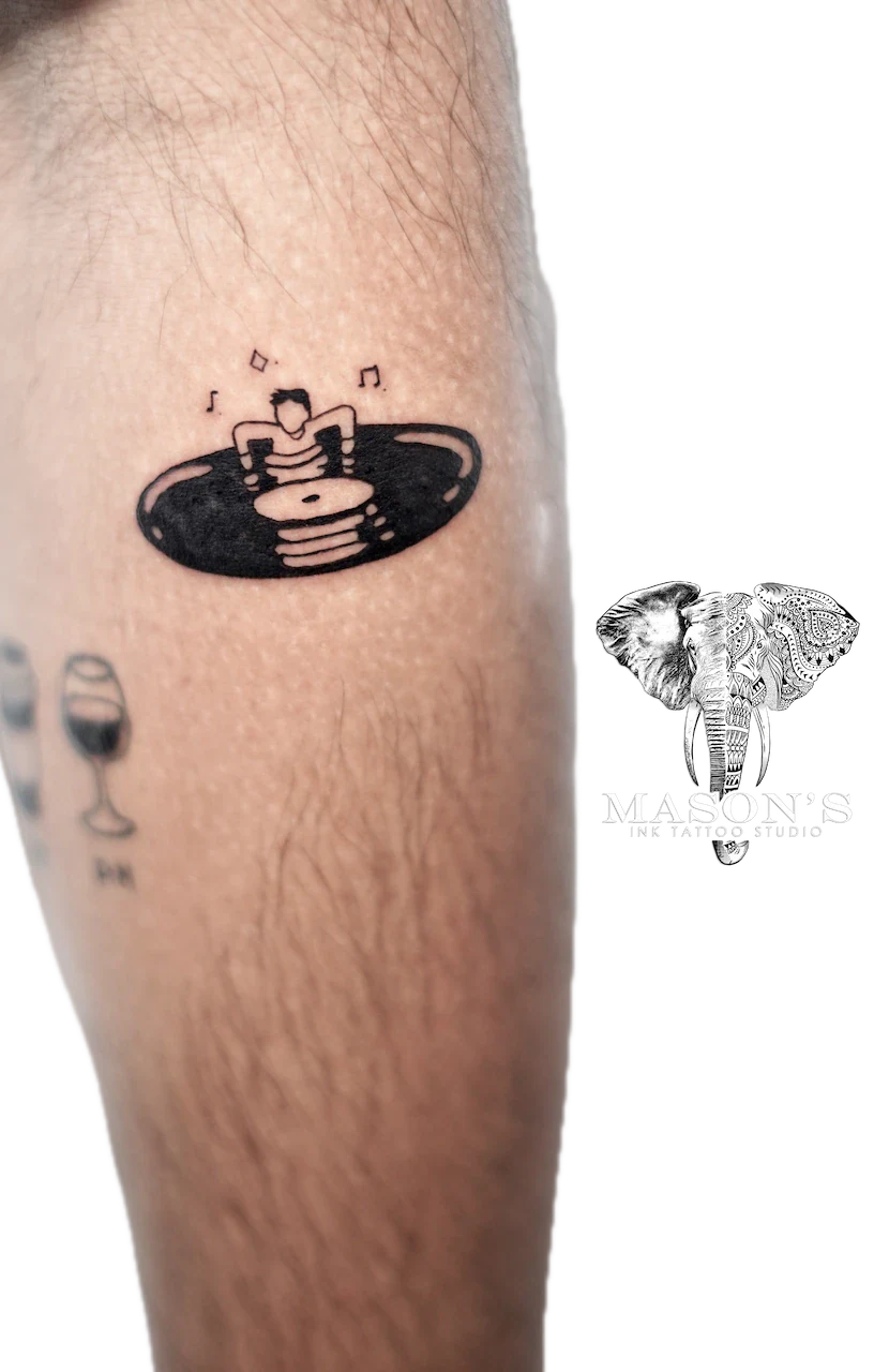 Blackwork Fine Line Human and DVD Tattoo Design by Mason's Ink Tattoo Studio, Bali
