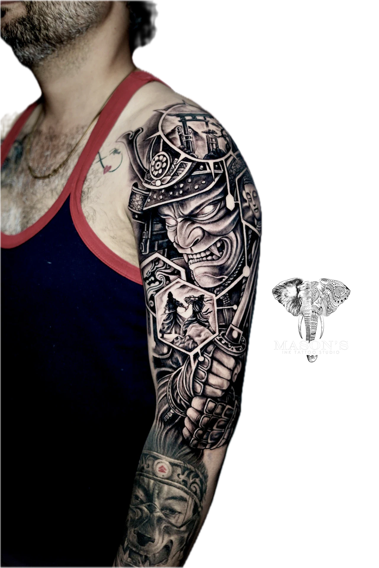 Black and Grey Japanese Tattoo Design: a full sleeve tattoo of a detailed armored warrior with a skull
