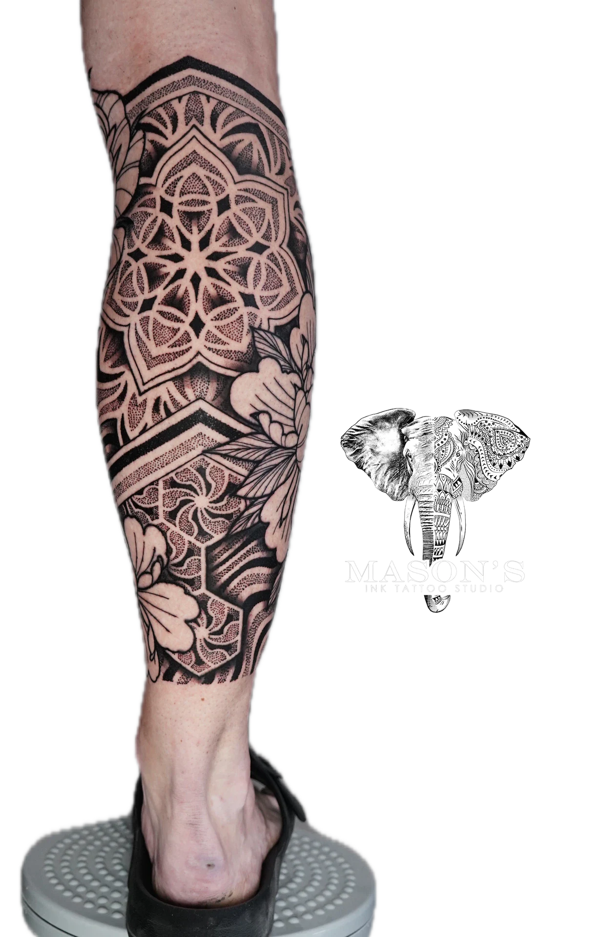 Black Work Mandala Tattoo Design: Intricate mandala and nature pattern on the calf