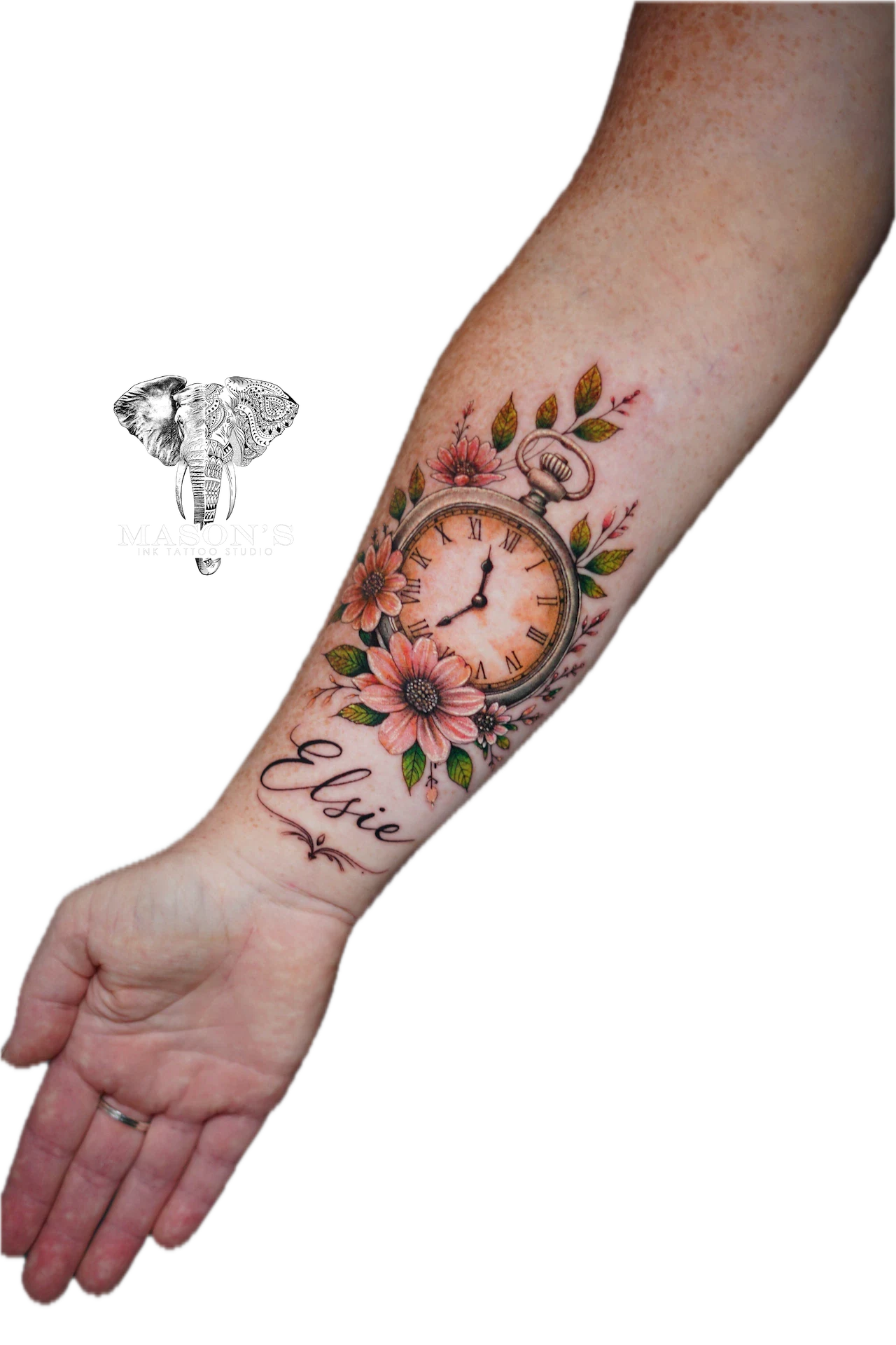Color realism pocket watch, flowers and script tattoo on forearm by Krisna at Mason's Ink Tattoo Studio, Bali