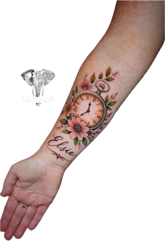 Color realism pocket watch, flowers and script tattoo on forearm by Krisna at Mason's Ink Tattoo Studio, Bali