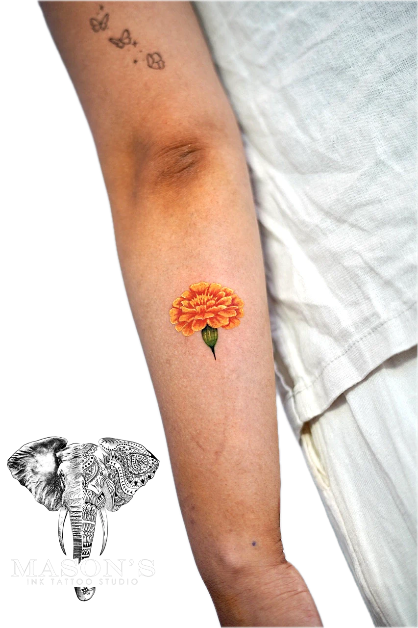 Realism Color Floral Tattoo Design: a small colorful flower with a butterfly and coffee bean on the forearm