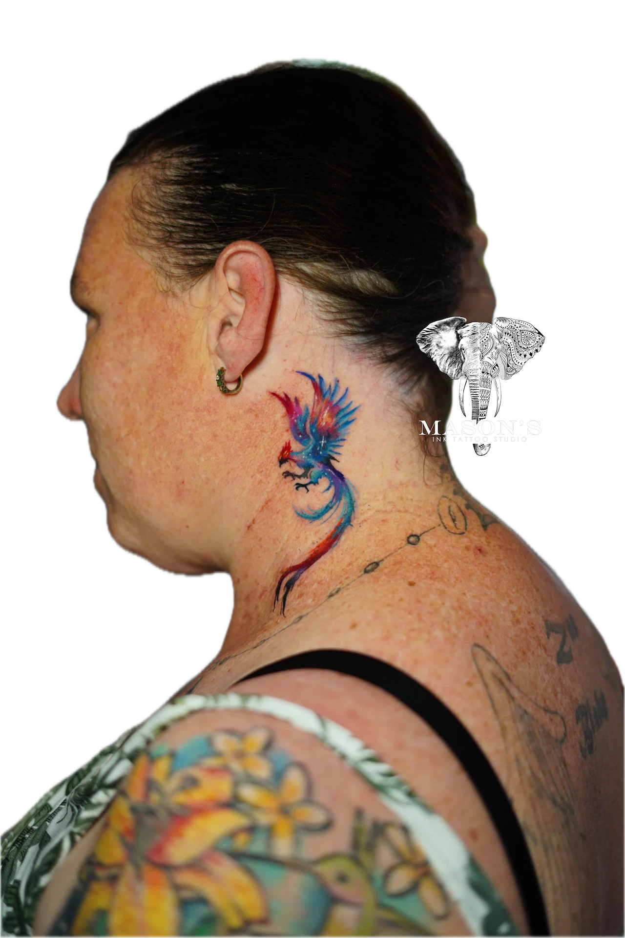 Color Phoenix Tattoo Design: a colorful phoenix tattoo on the side of the neck