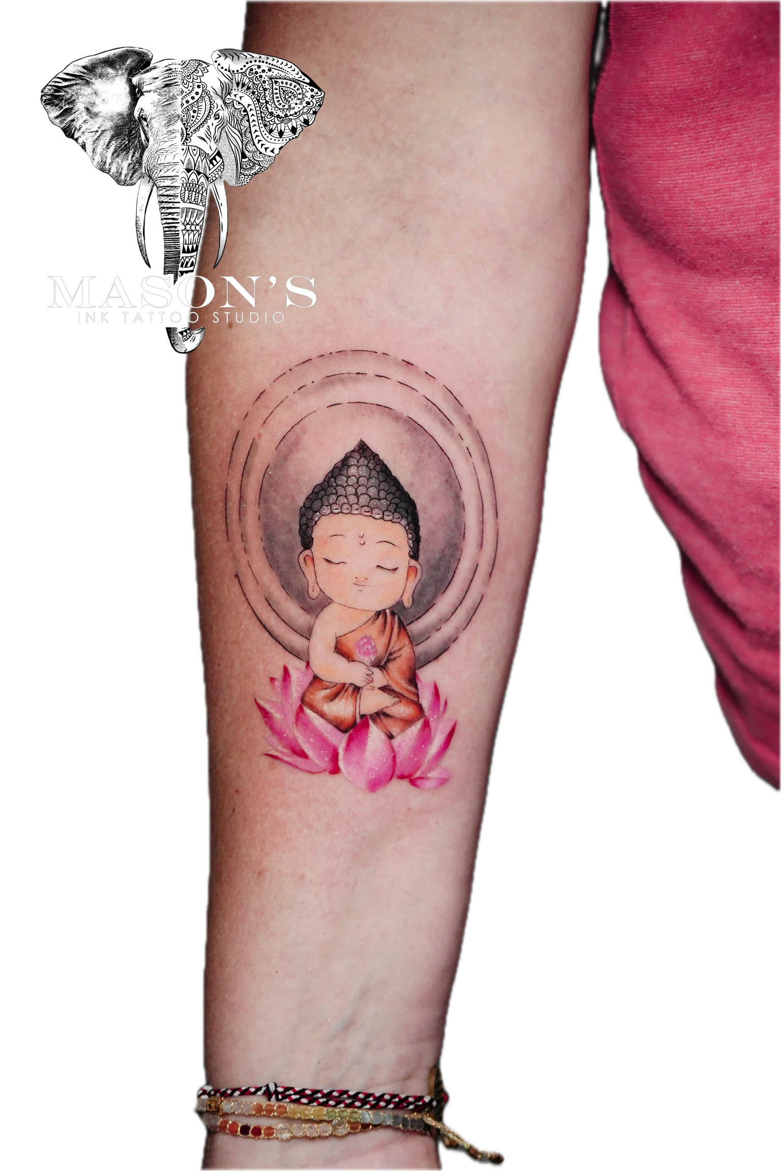 Cartoon Buddha Color Tattoo Design: a small colour tattoo of a Buddha sitting on a lotus