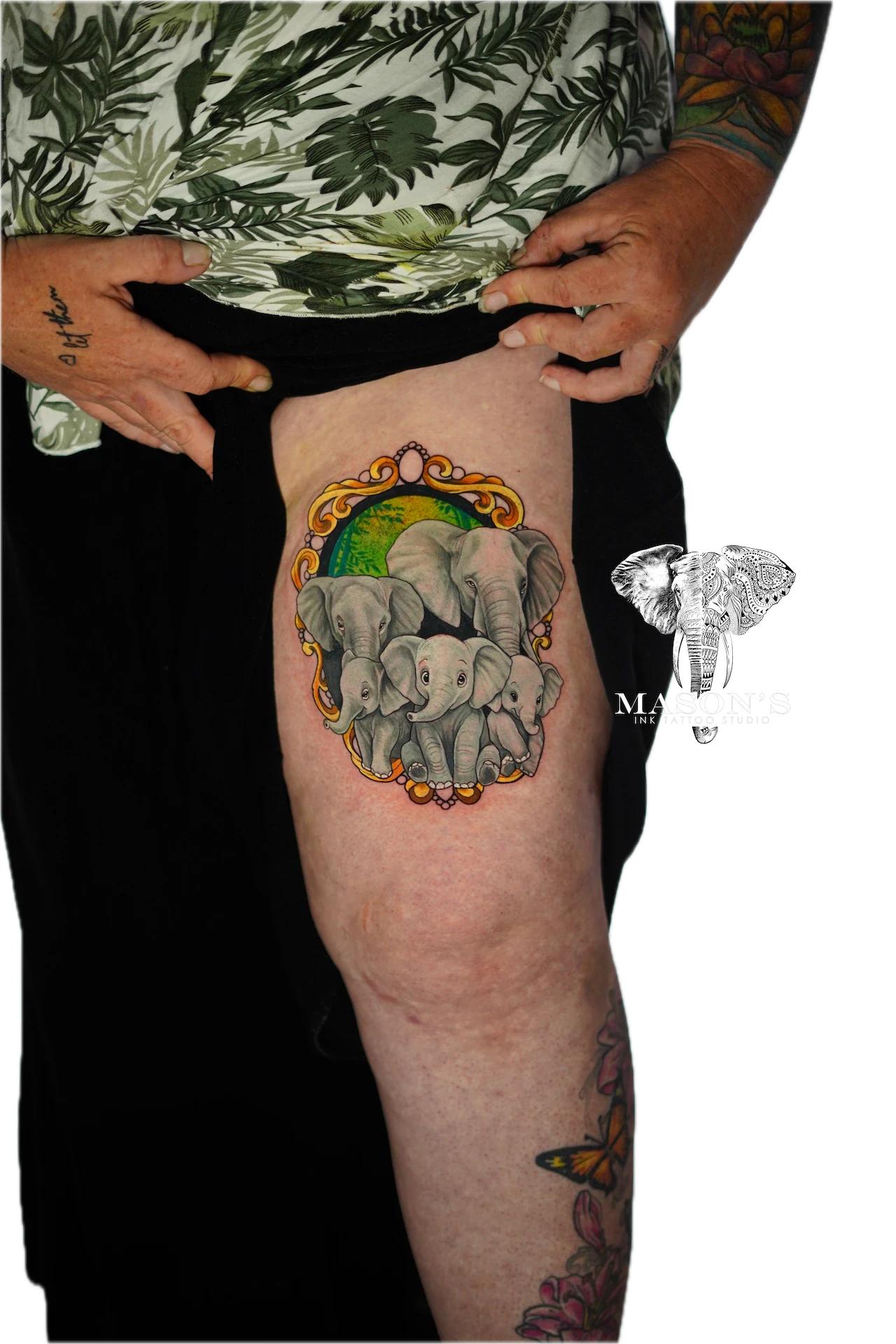 Color Elephant Tattoo Design: Three elephants in a circle with leaves and ornaments