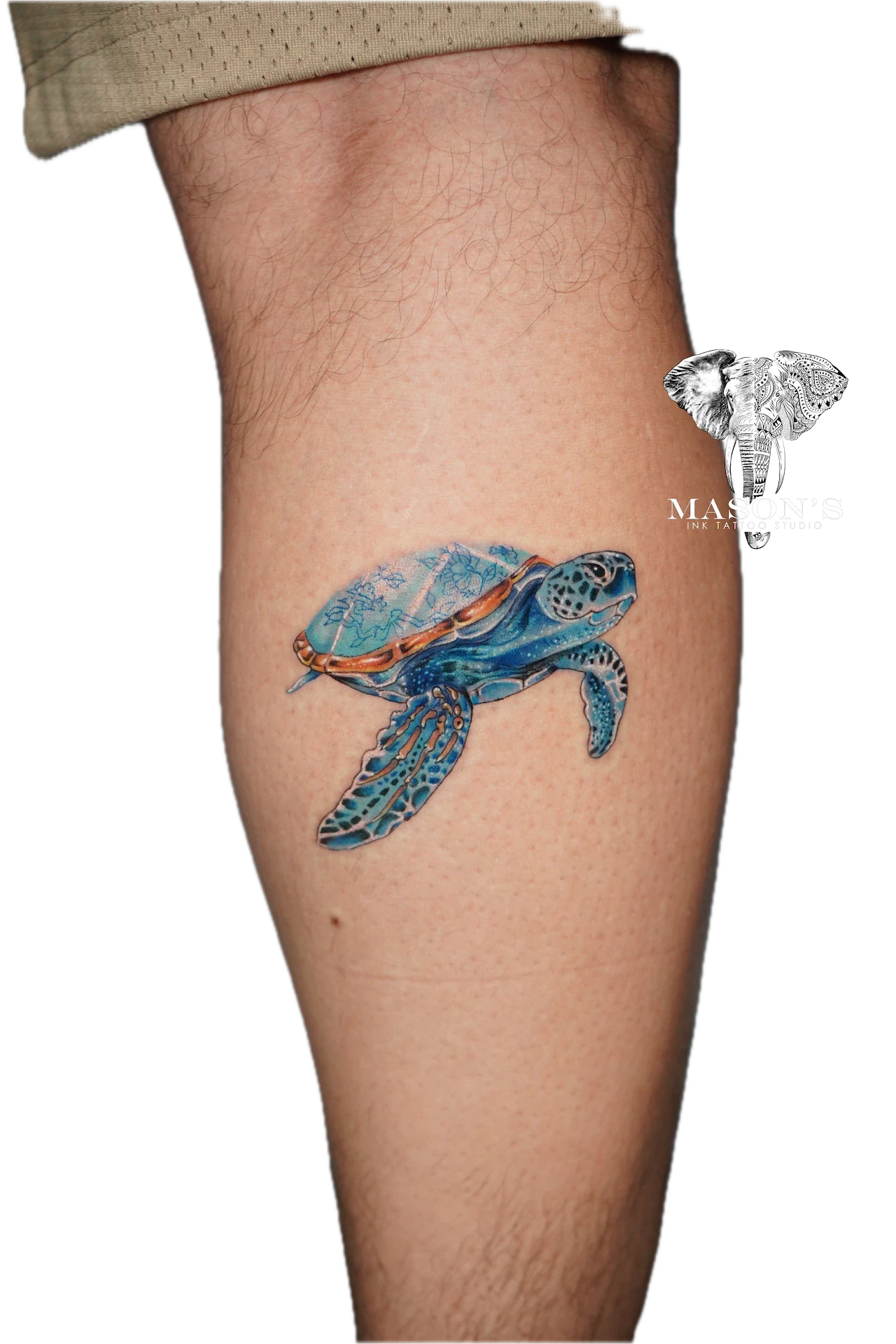 Color Turtle Tattoo Design: a colorful turtle with floral patterns on its shell