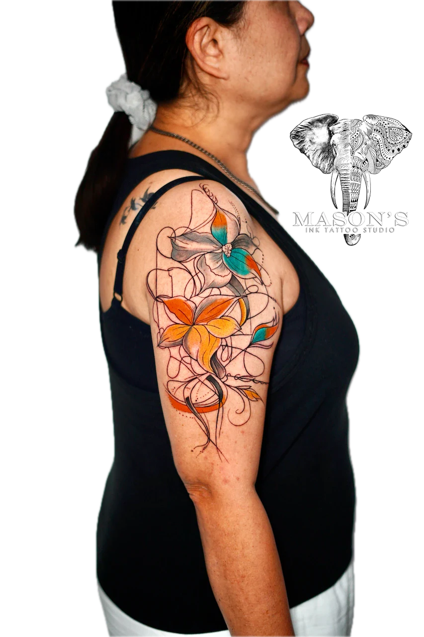 Fine Line Color Floral Tattoo Design: a colorful bird and flowers on a vine upper arm tattoo