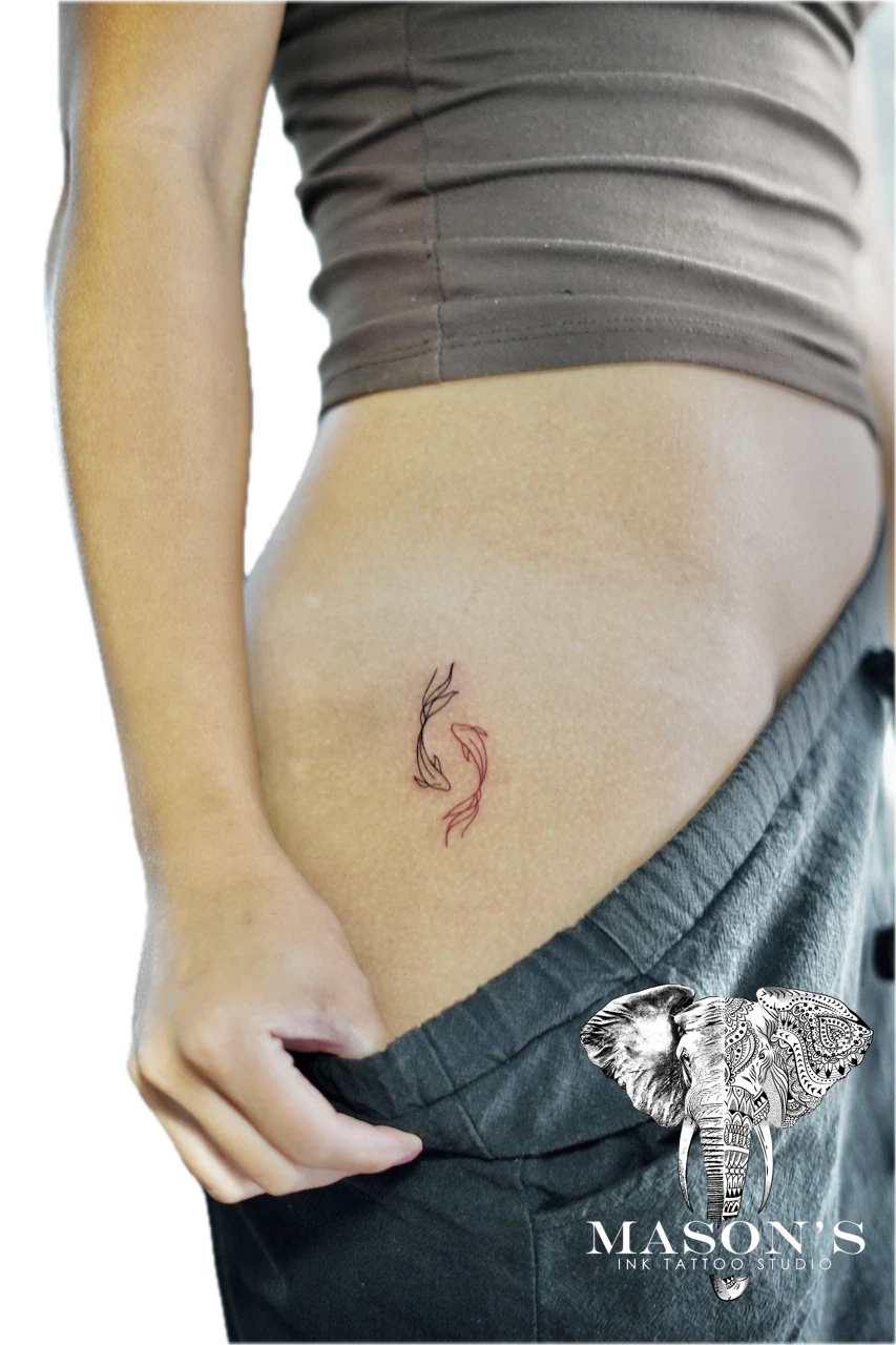 Fine Line Color Fish Yin Yang Tattoo by Mason's Ink Tattoo Studio, Bali
