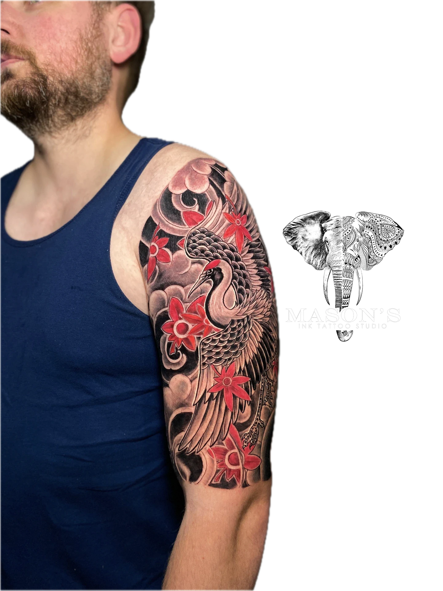 Colored Japanese Tattoo Design: a colourful phoenix with flowers and swirls on the upper arm