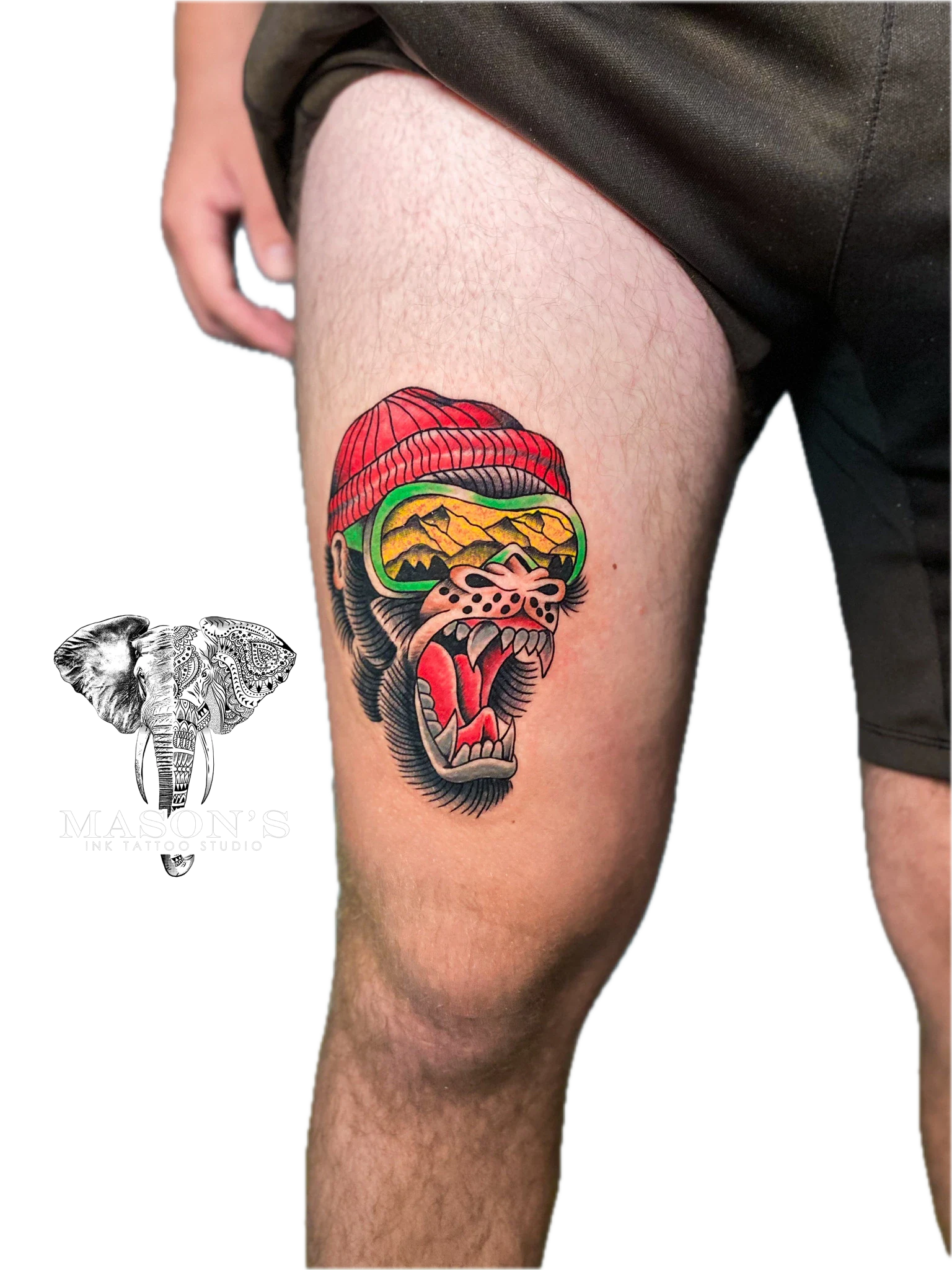 Colored Neo-Traditional Monkey Tattoo Design: a colorful tiger wearing a hat on a thigh